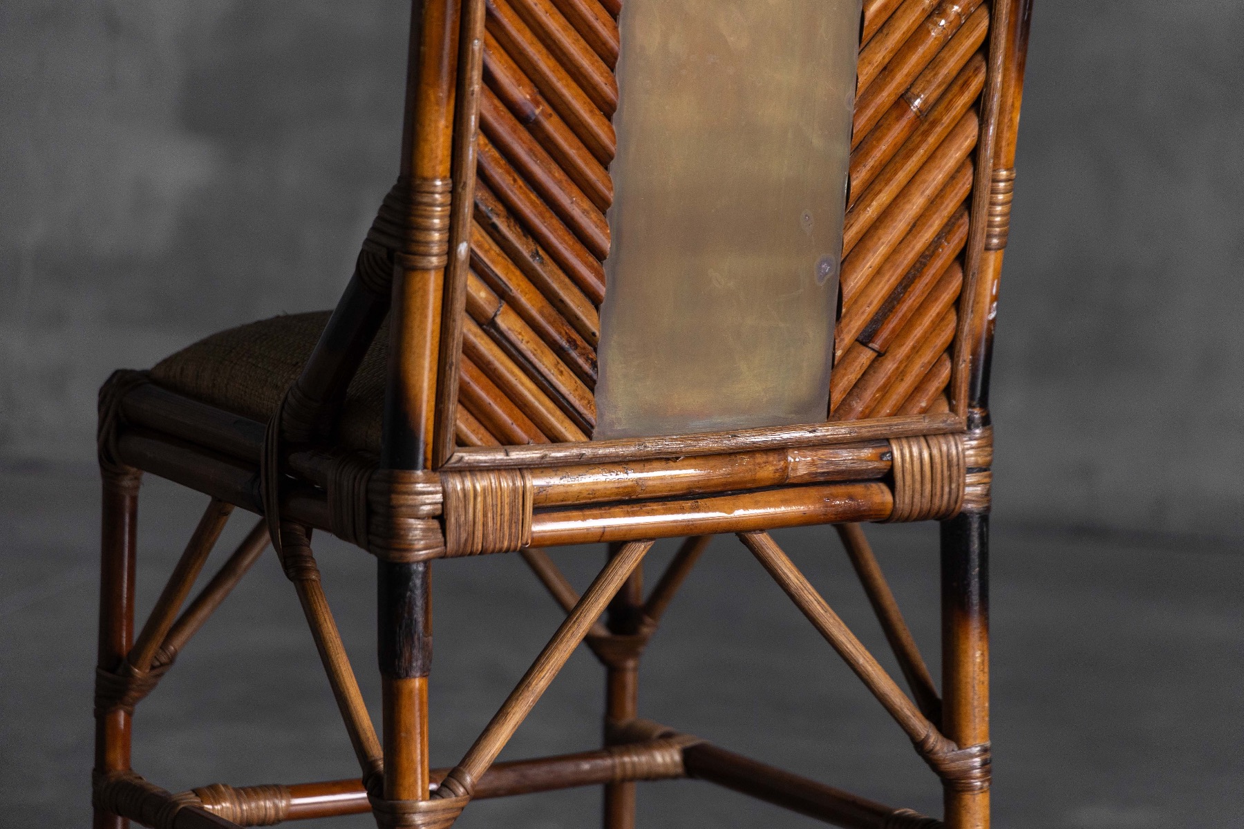 Architectural chair with bamboo structure and brass accents