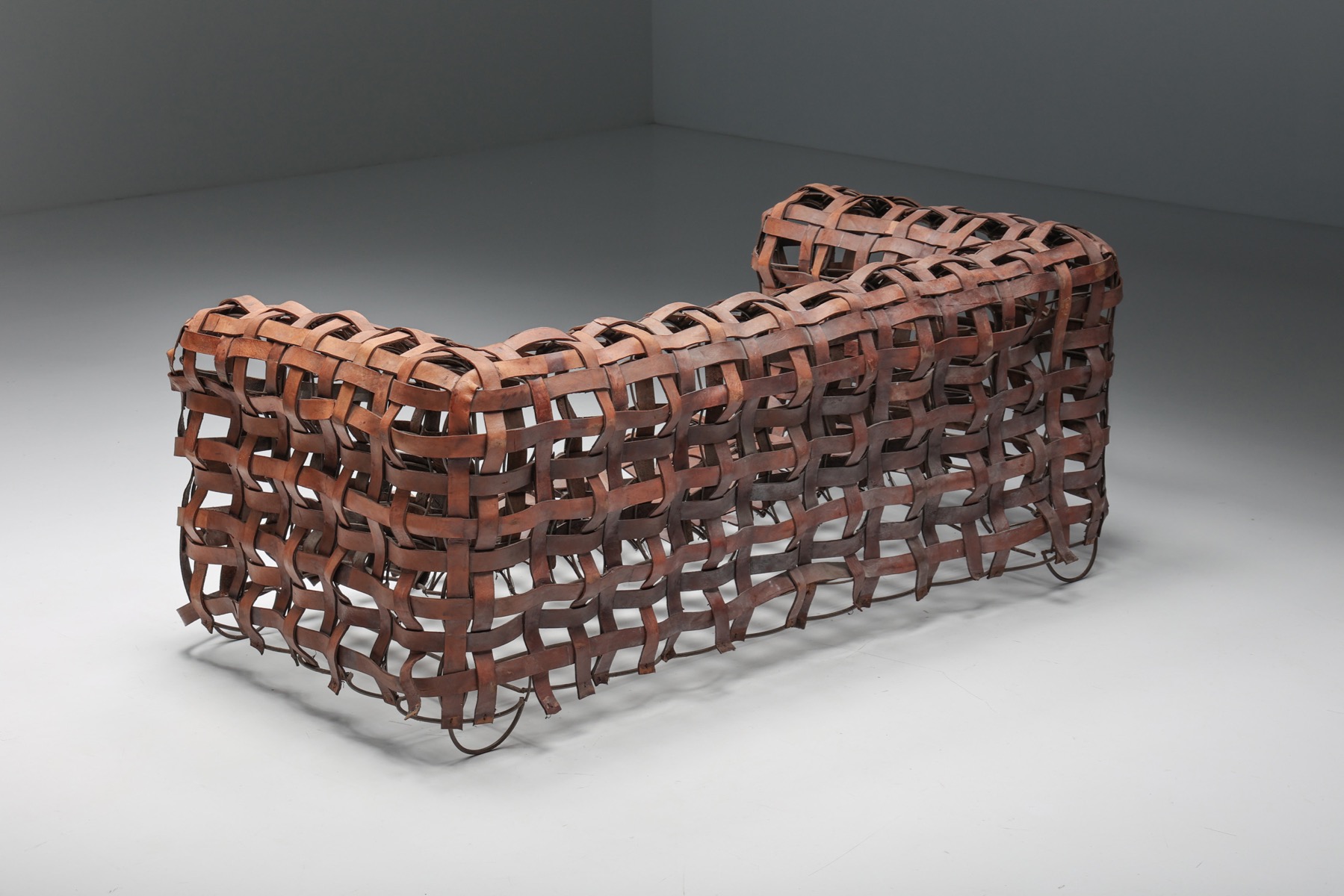 Architectural leather sofa in woven design from the 1950s