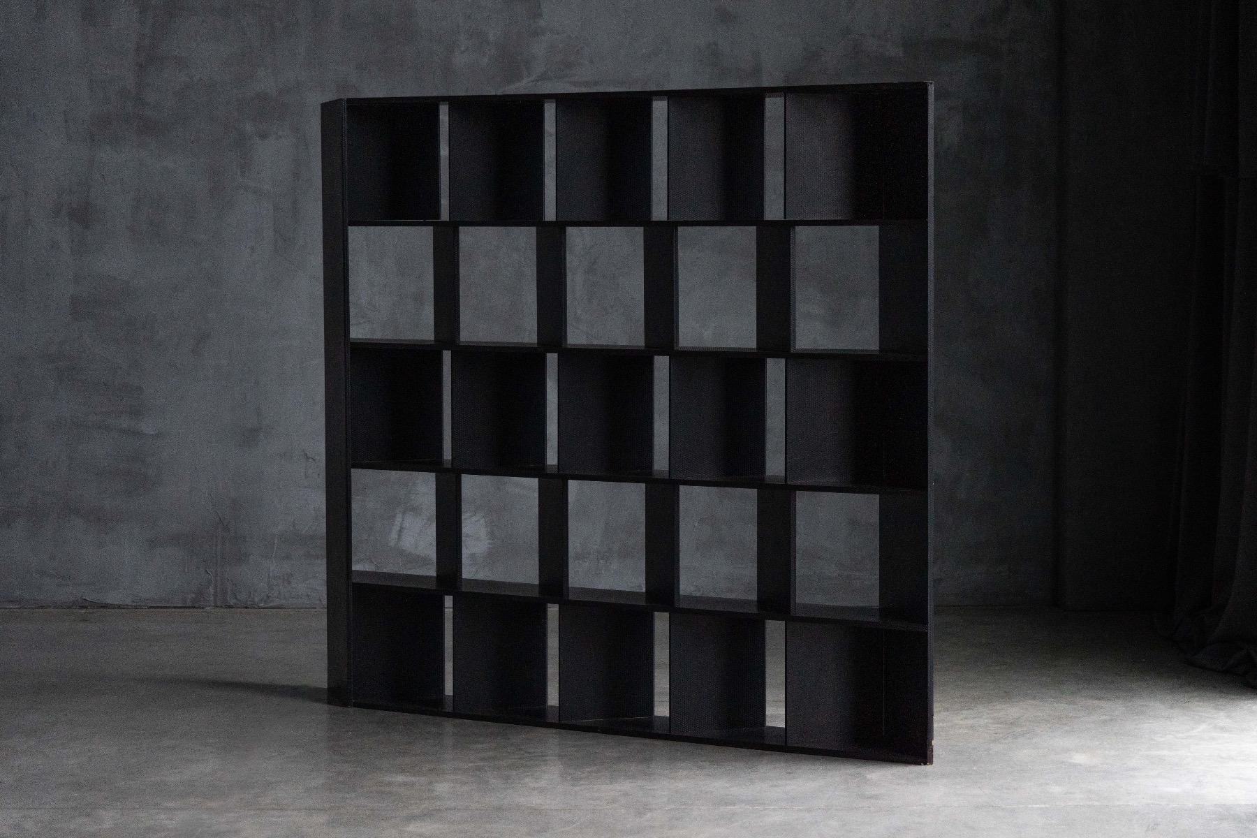 Graphic geometric bookcase in postmodern style