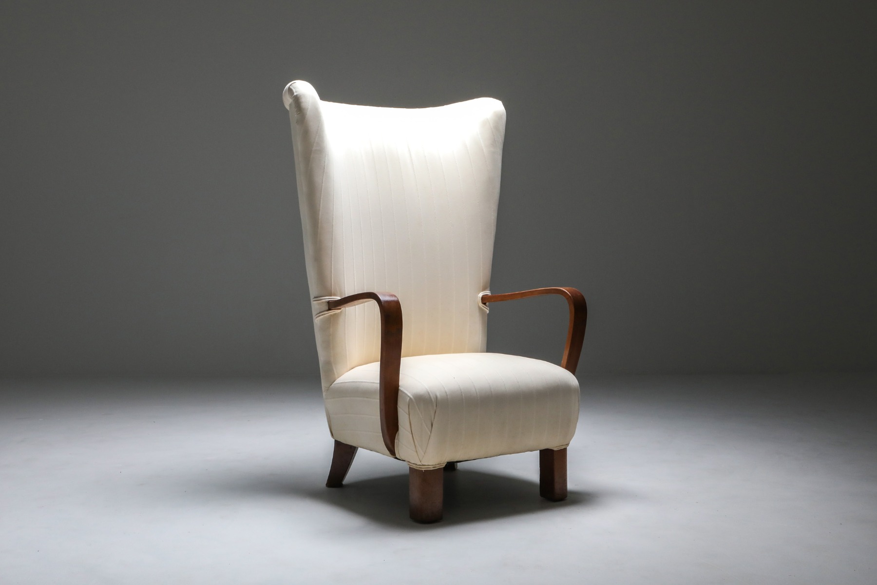Elegant wingback chair with ottoman in white design