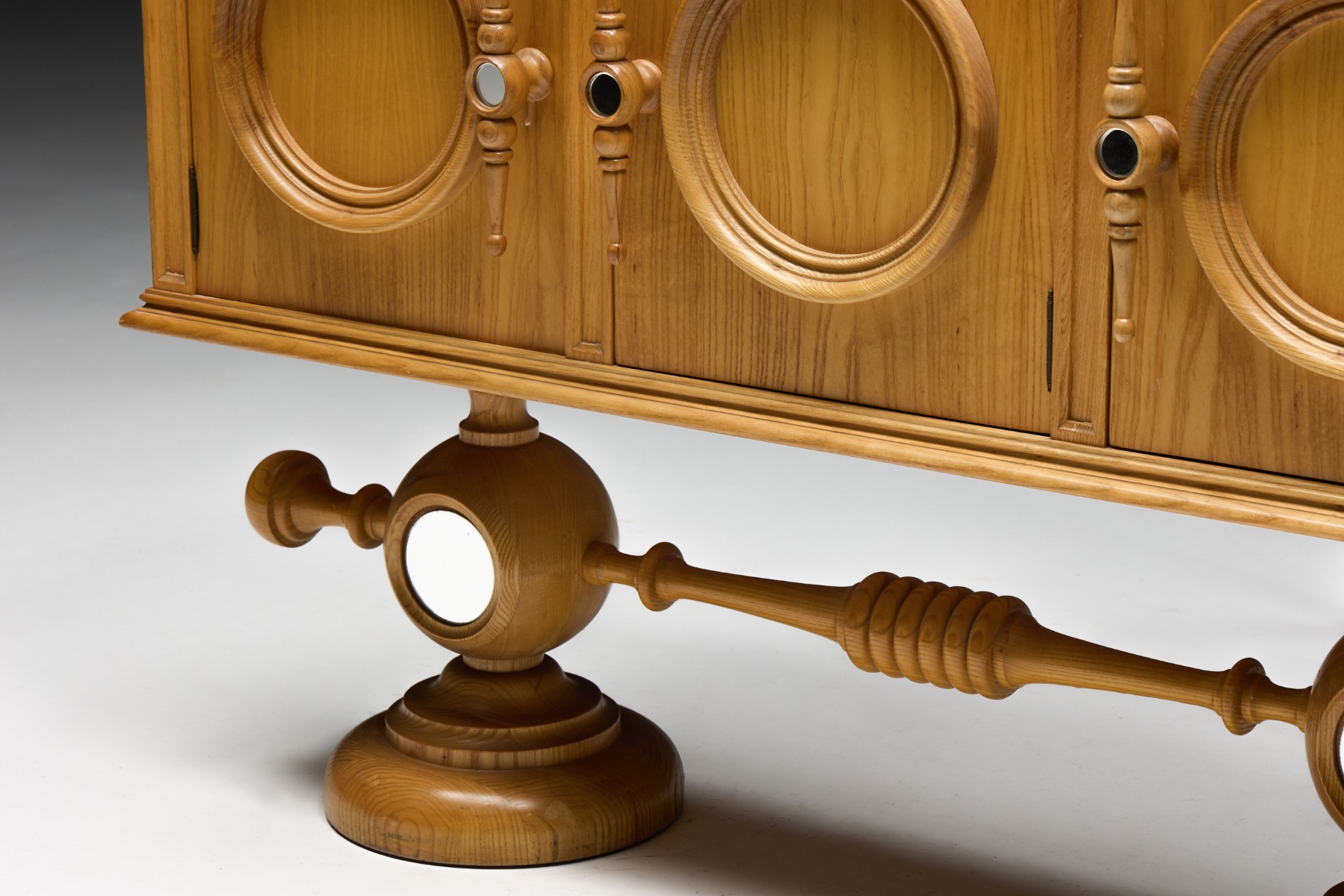 French architectural revival vanity cabinet with sculptural base
