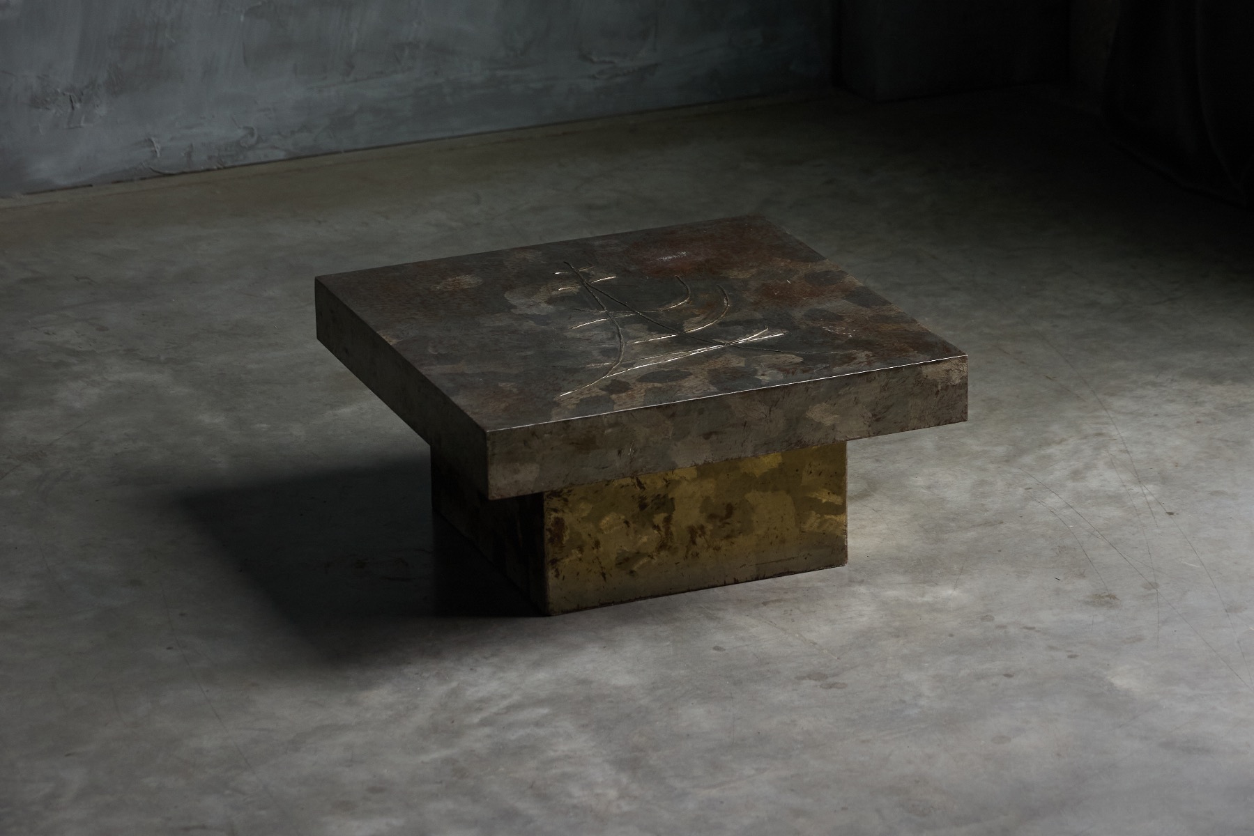 Minimalist brutalist steel table with strong presence
