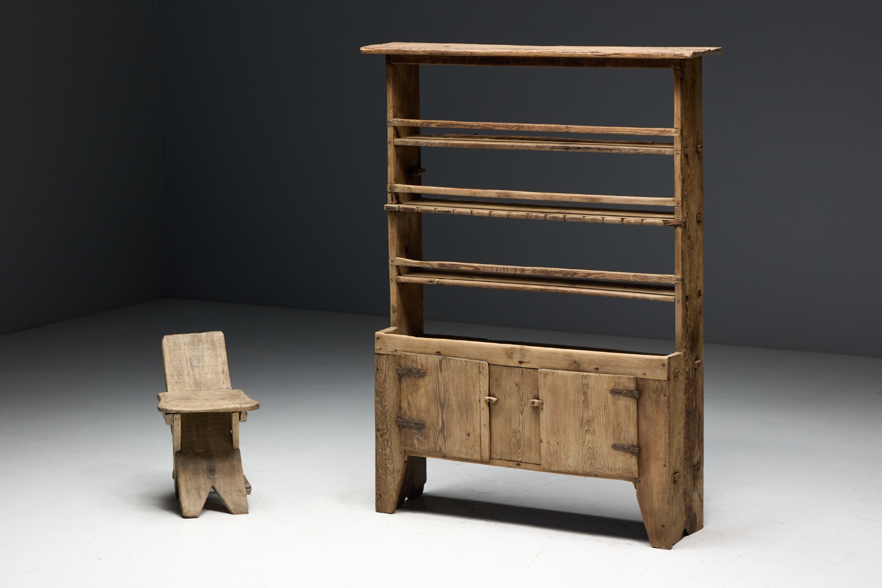 Vernacular rustic primitive cabinet with utilitarian design