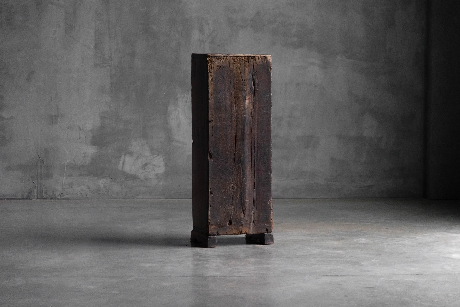 Handcrafted wooden wabi sabi cabinet with primitive form