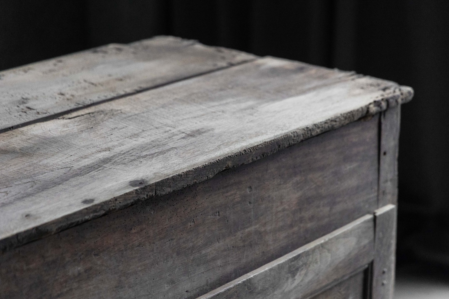 Handcrafted wooden wabi sabi cabinet with primitive form