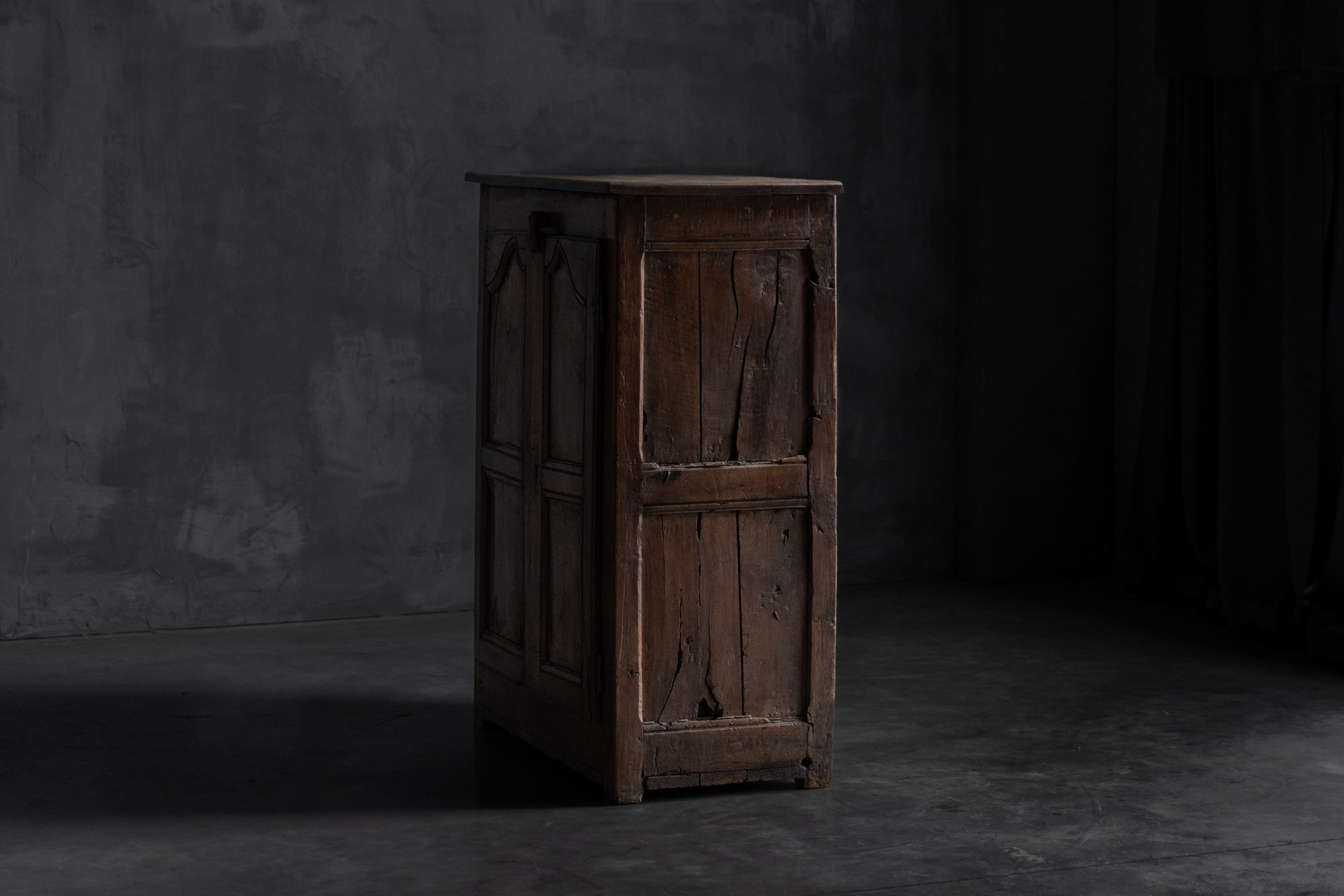 Heritage primitive wooden cabinet with robust form