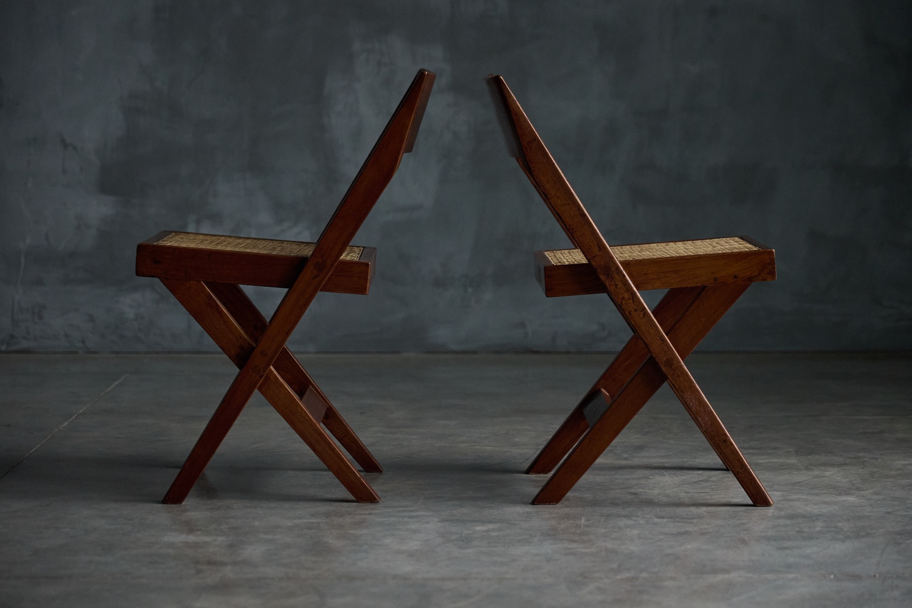 Minimalist library chair designed by Pierre Jeanneret