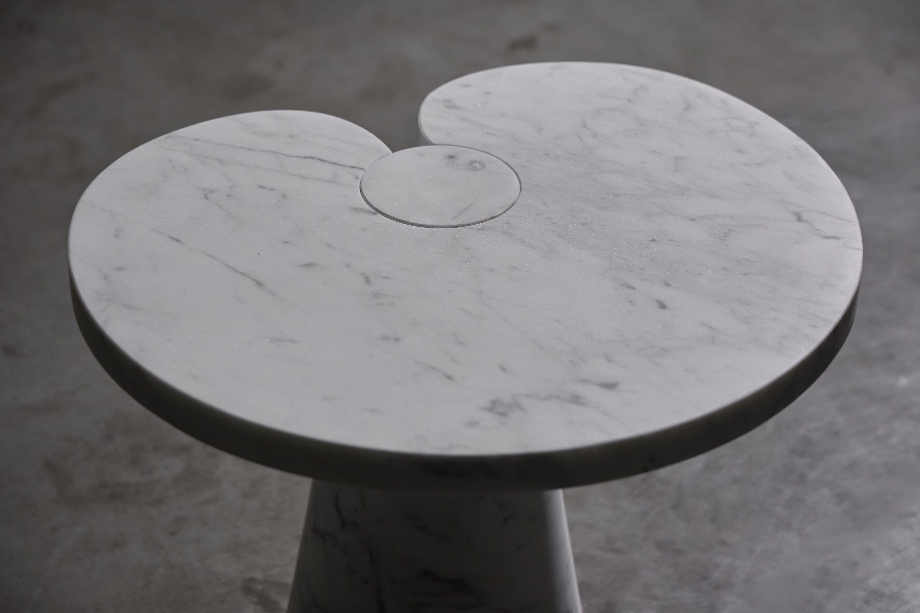 Minimalist Carrara marble table with refined proportions