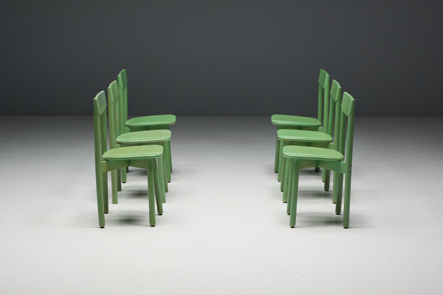 Modernist green dining chair with architectural lines