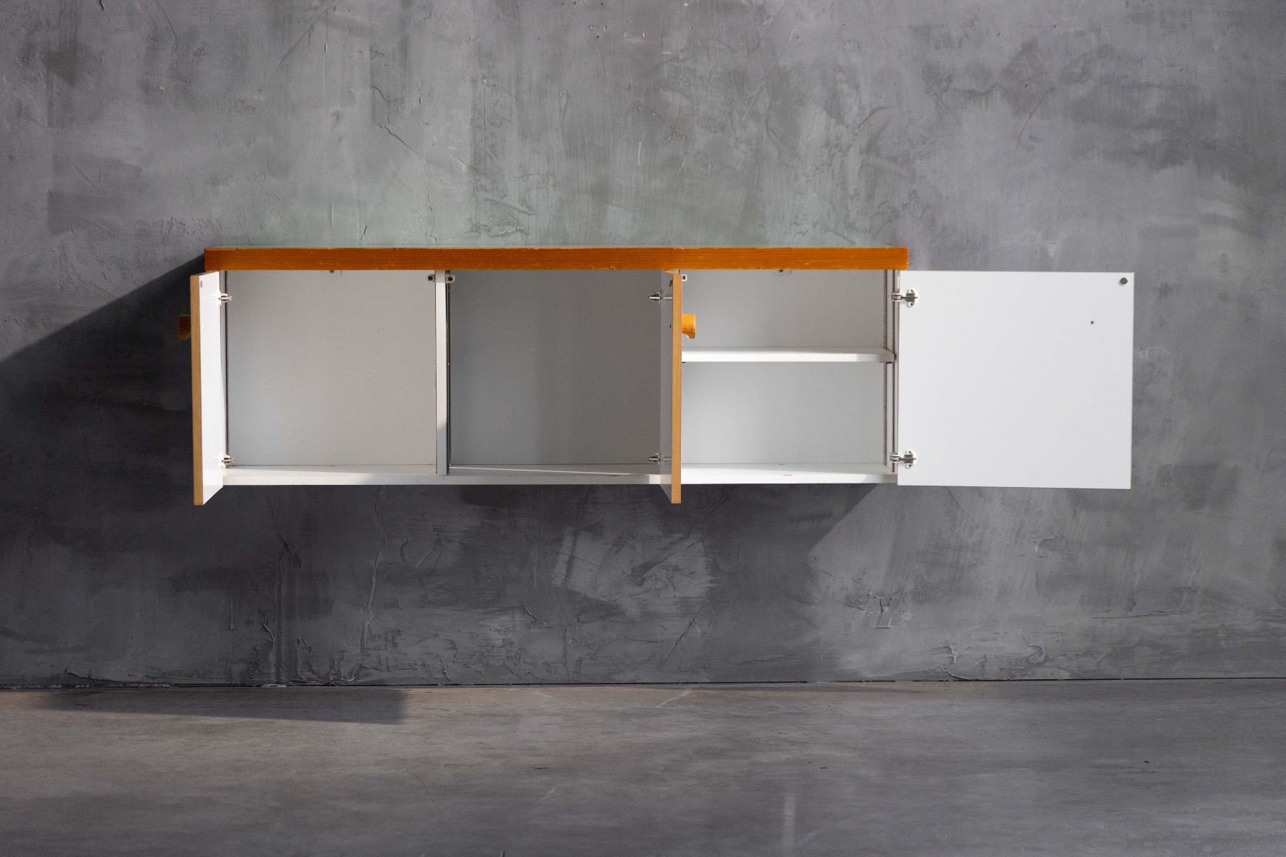 Modular wall mounted cabinet by Charlotte Perriand from the 1970s