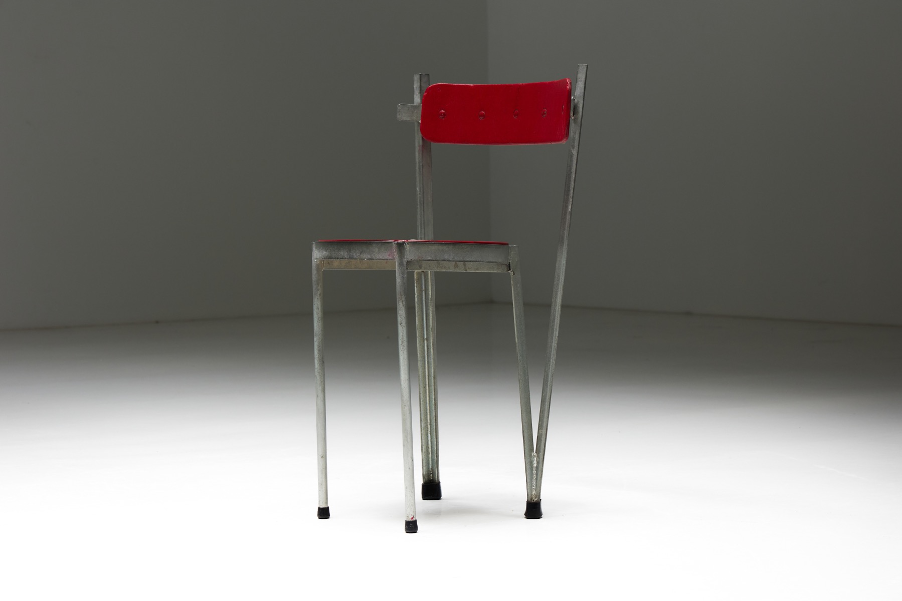 Rustic industrial chair with metal frame from the 1940s