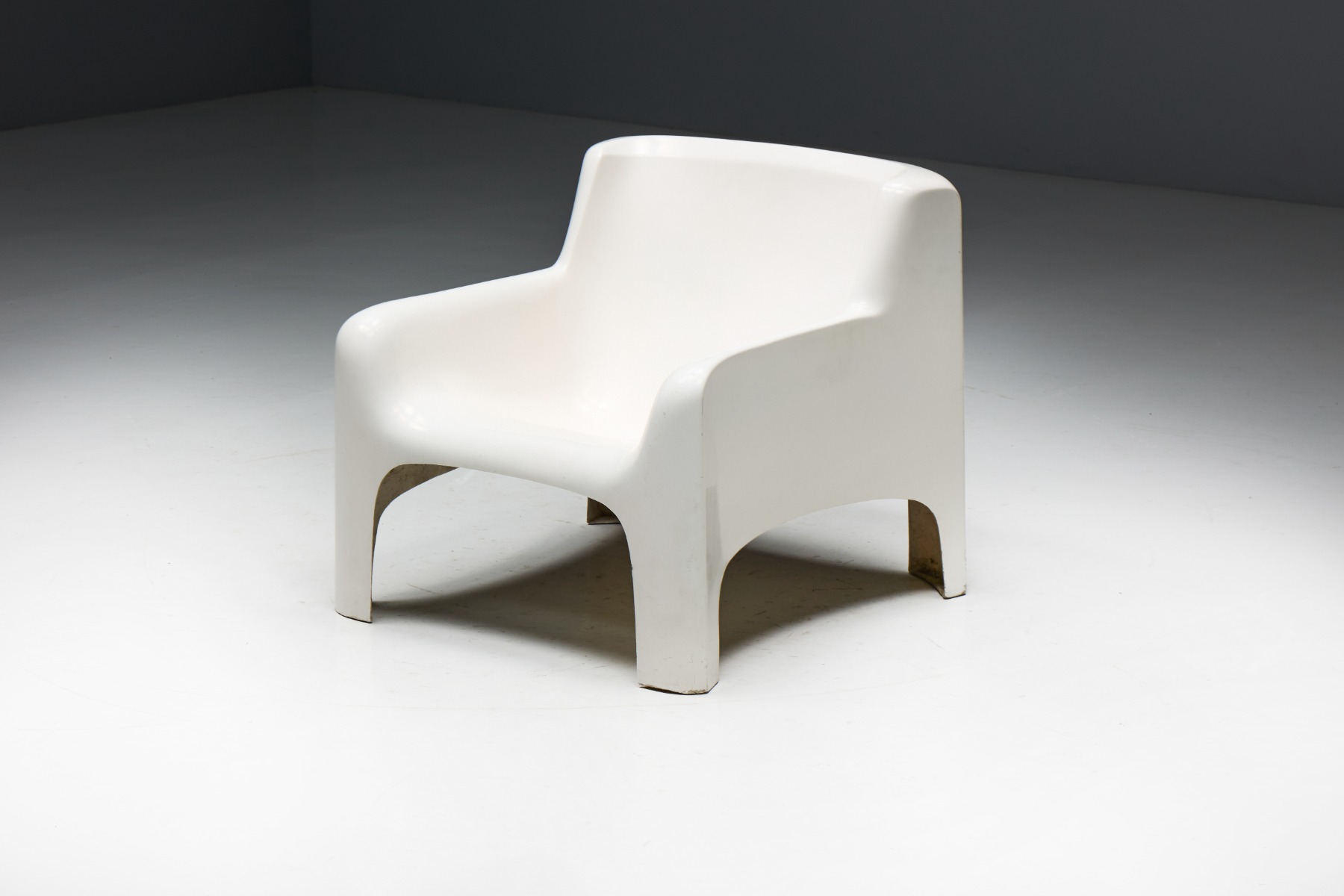 Sculptural fiberglass lounge chairs by Carlo Bartoli design