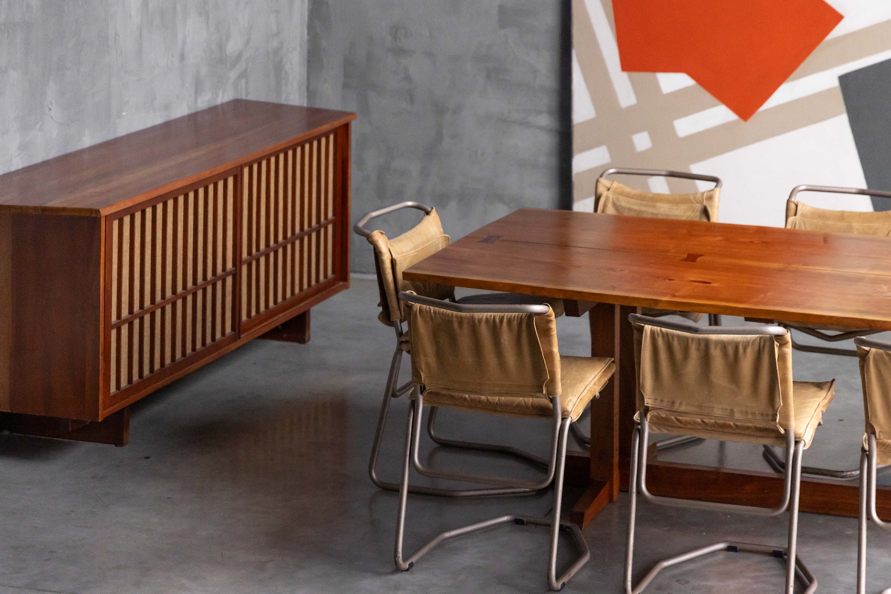 Sculptural wood dining table by Mira Nakashima