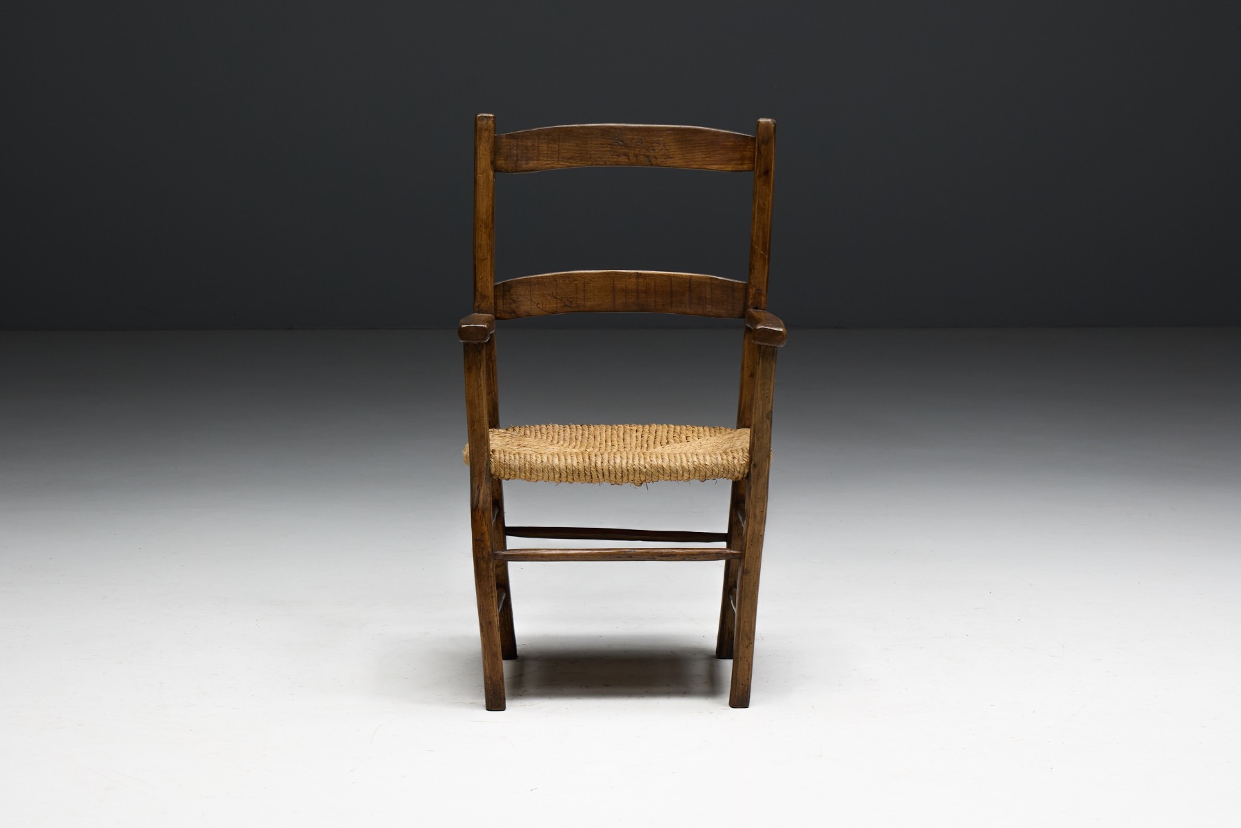 Antique vernacular armchair with natural aged patina