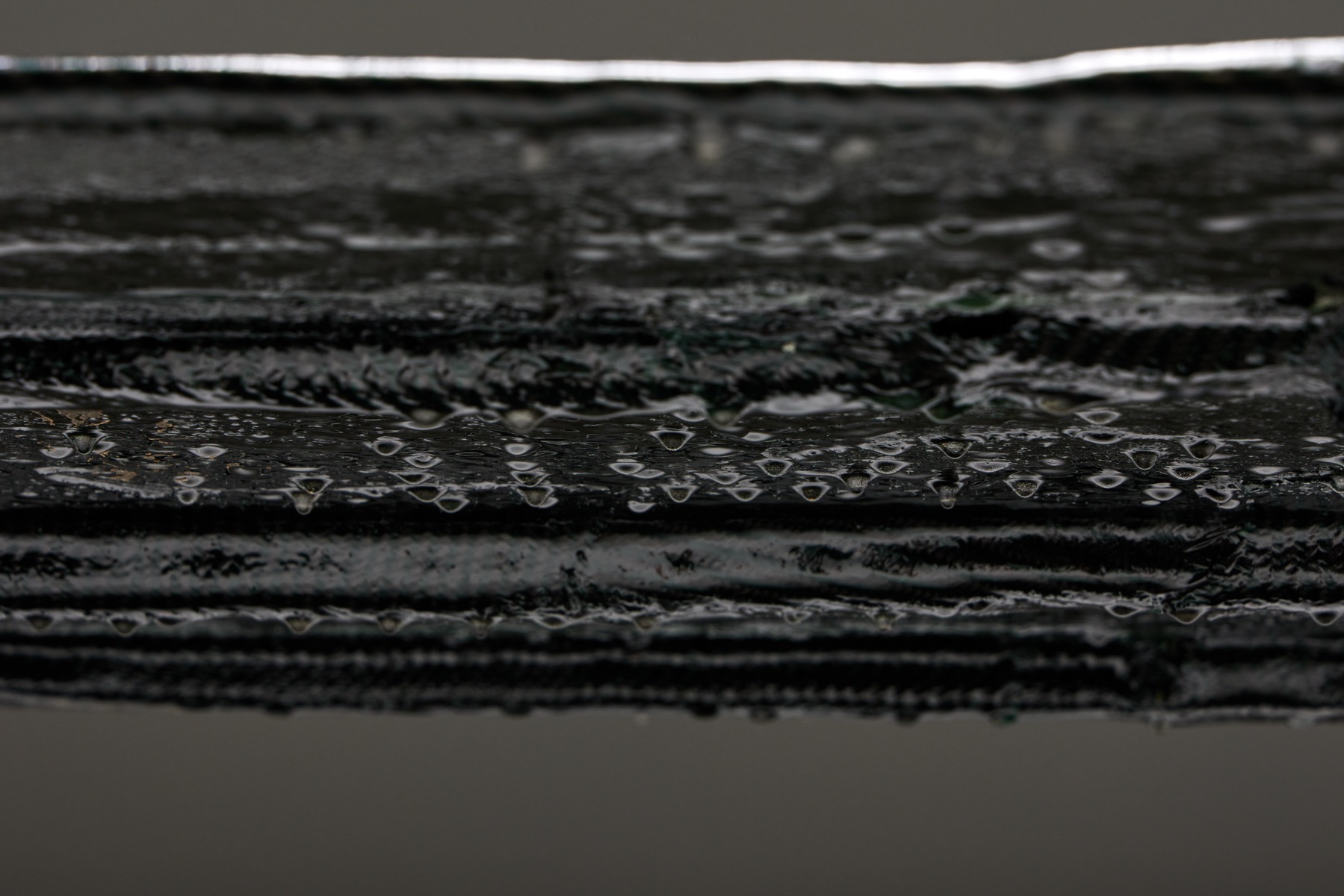 Sleek carbon fibre table in minimalist style