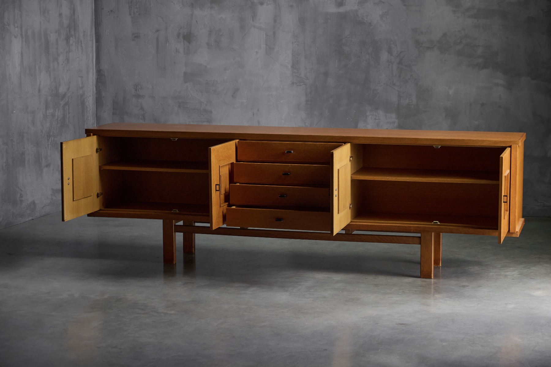 Solid oak brutalist buffet with powerful proportions