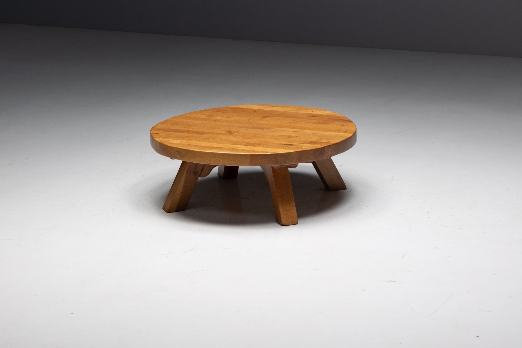 Solid oak brutalist round coffee table with strong proportions