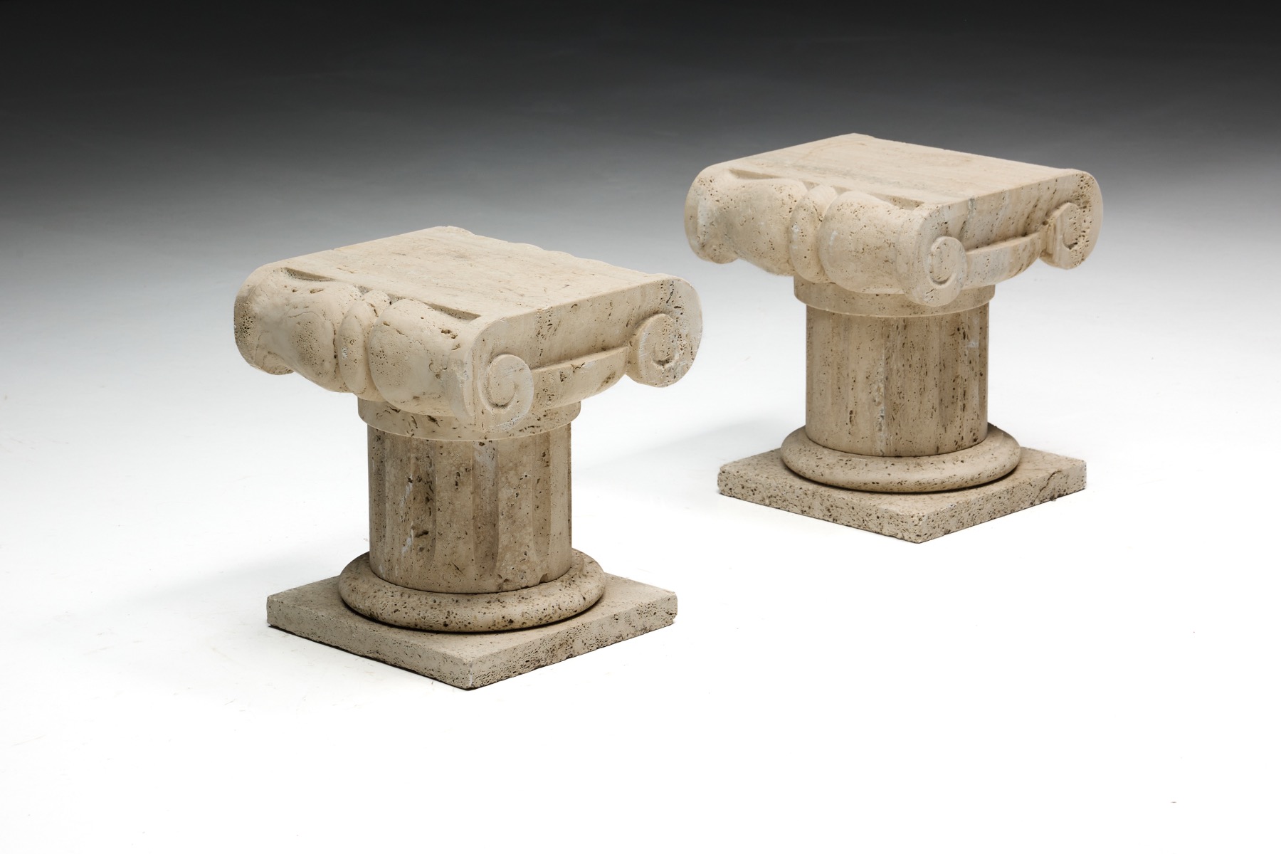 Travertine stone pedestal side table with robust mineral texture