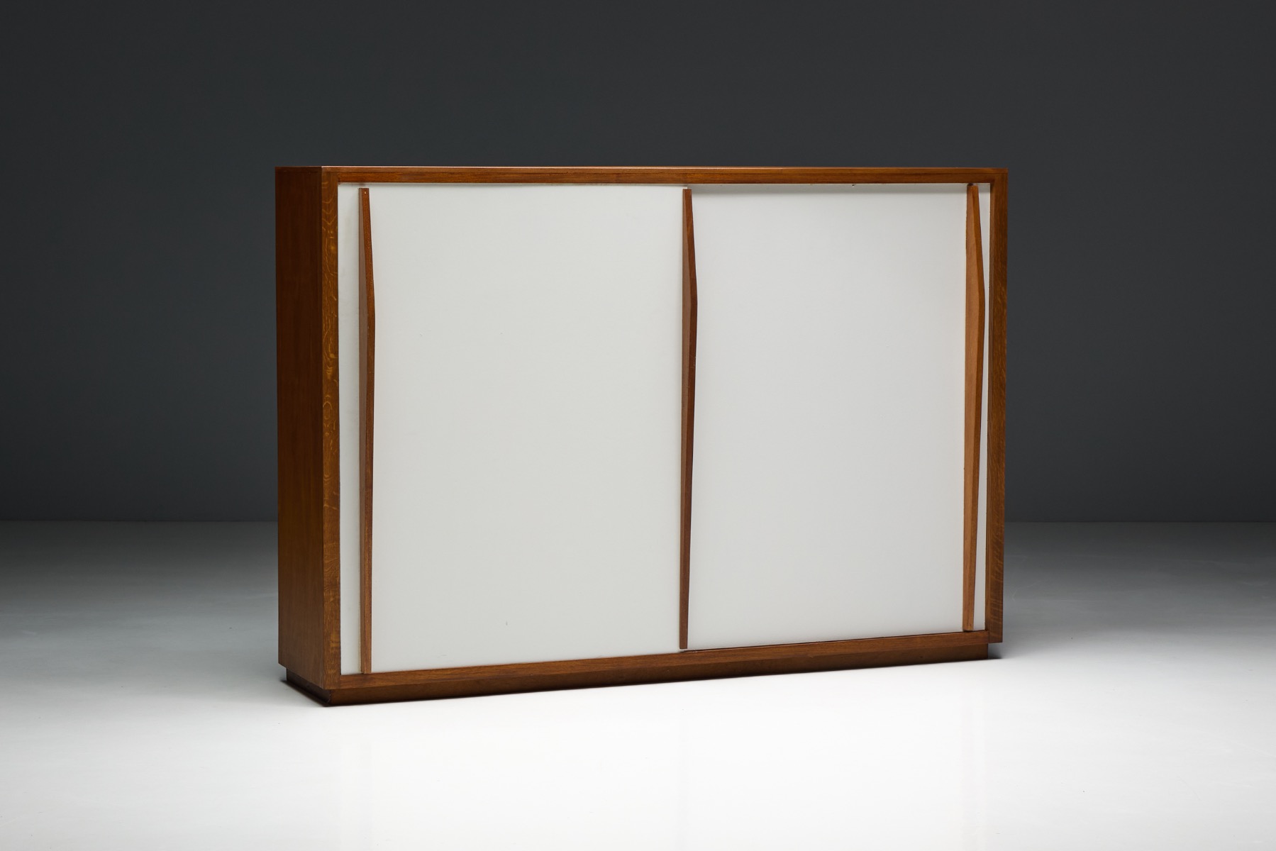 Storage cabinet with generous shelving and hanging space, mid century design