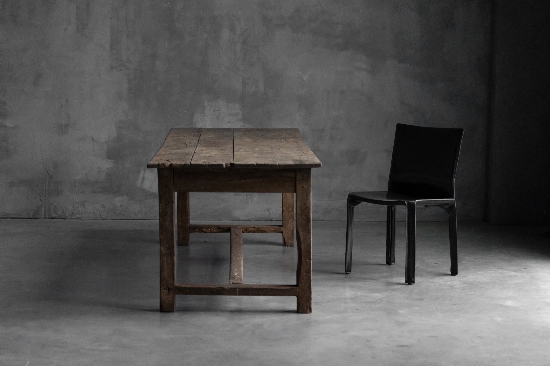 Timeworn rustic farmhouse dining table with authentic patina