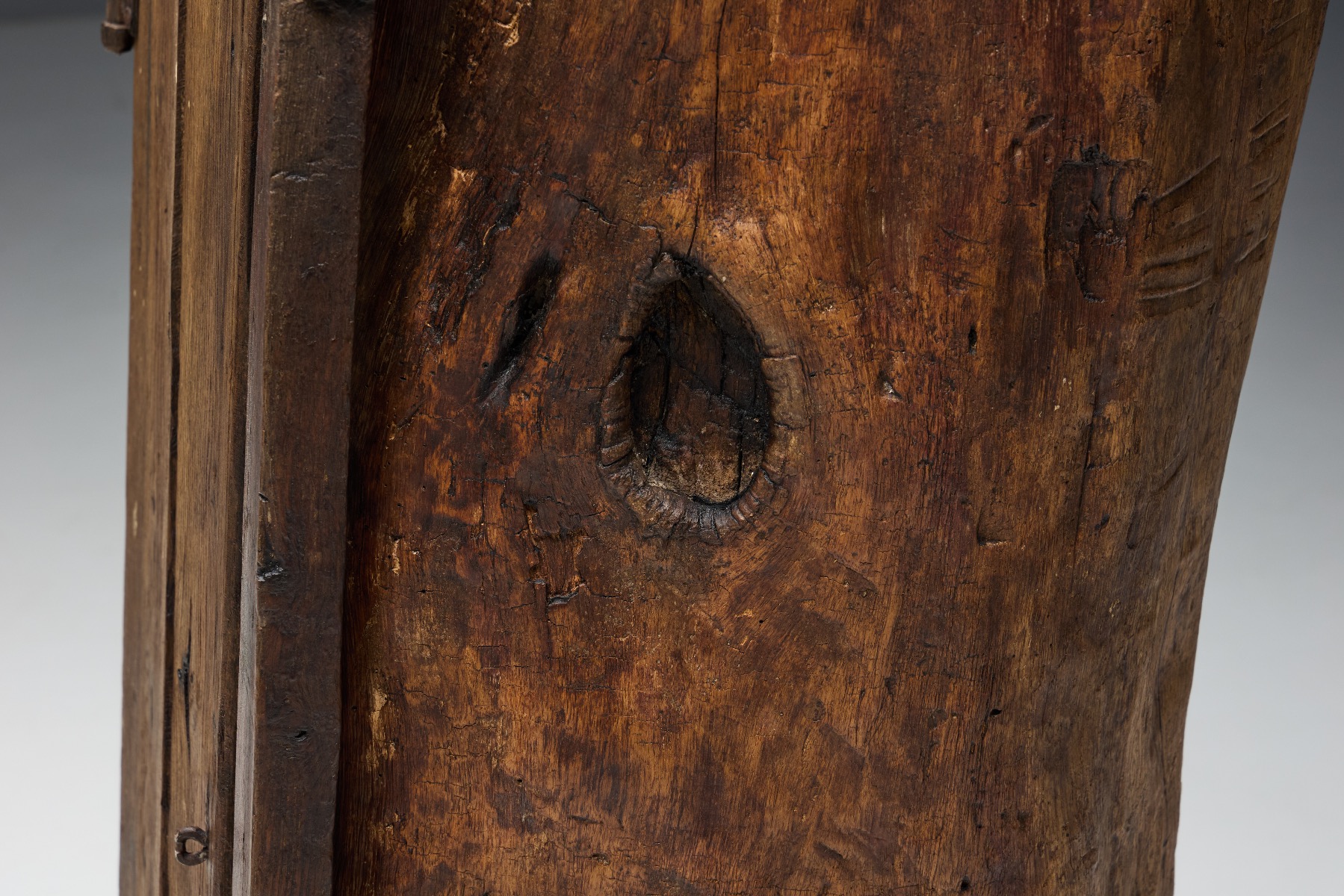 Timeworn bonnetière cabinet with historic presence