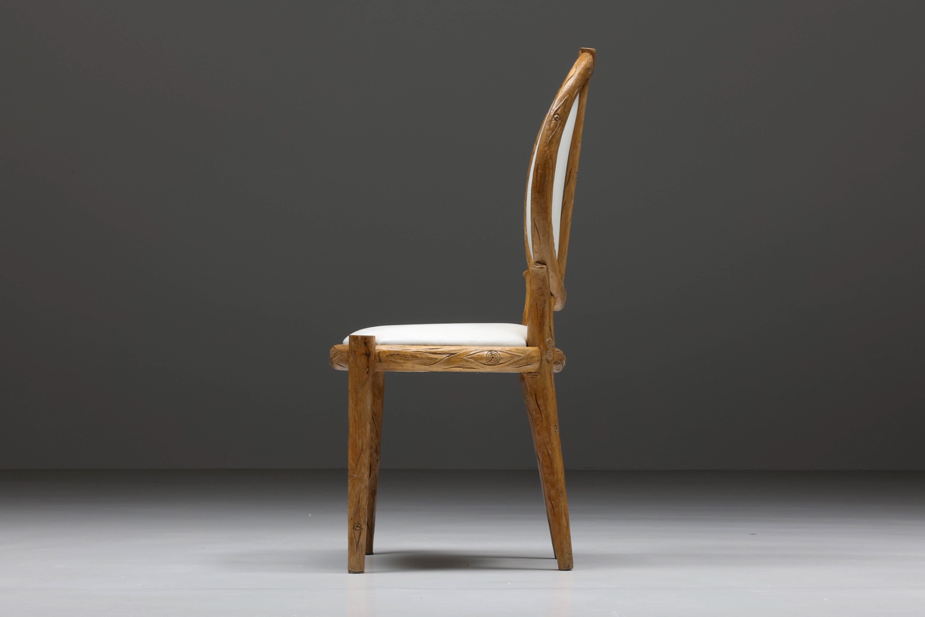 Traditional carved wood dining chairs in Thonet style