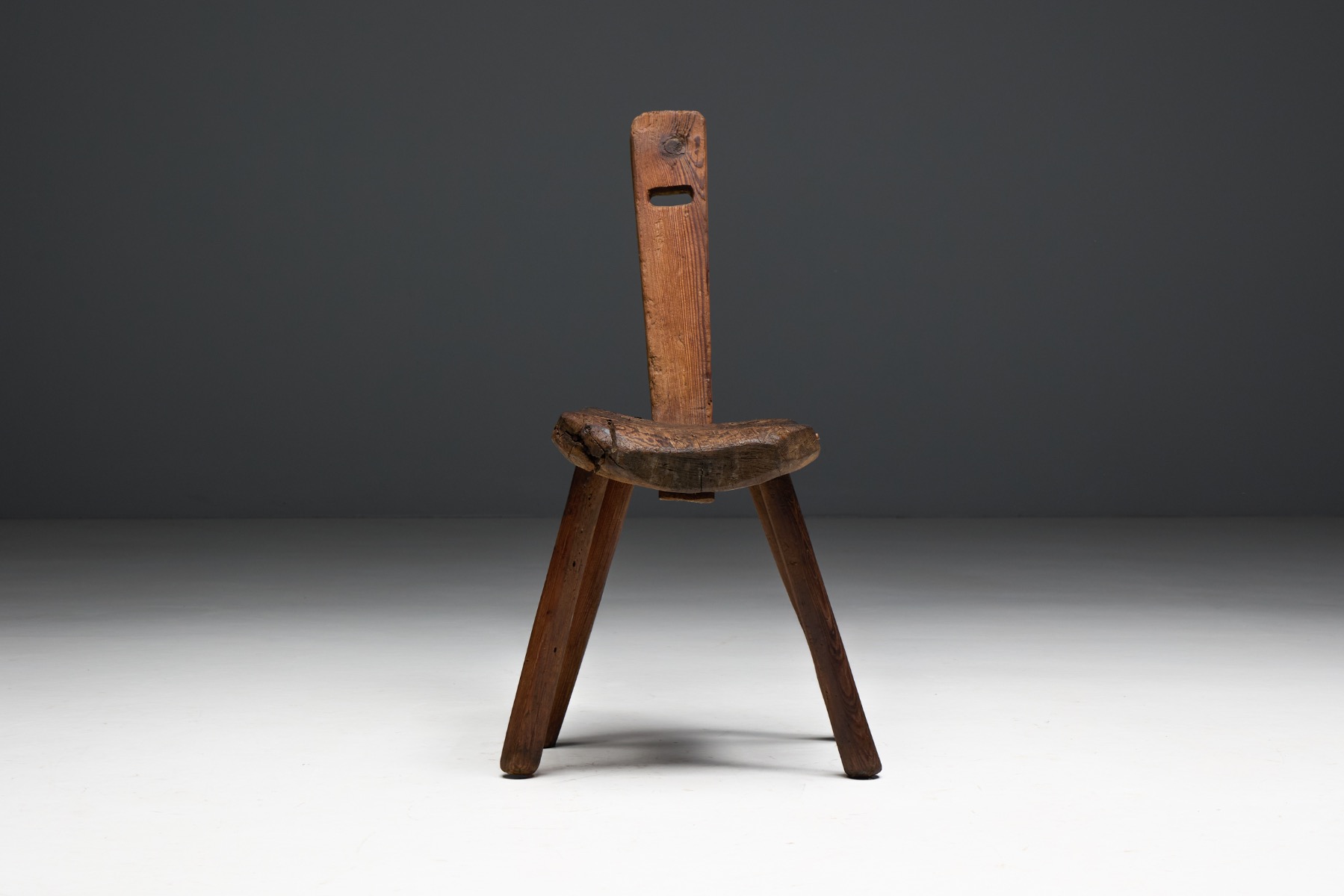 Aged wood Alpine folk chair with authentic wear