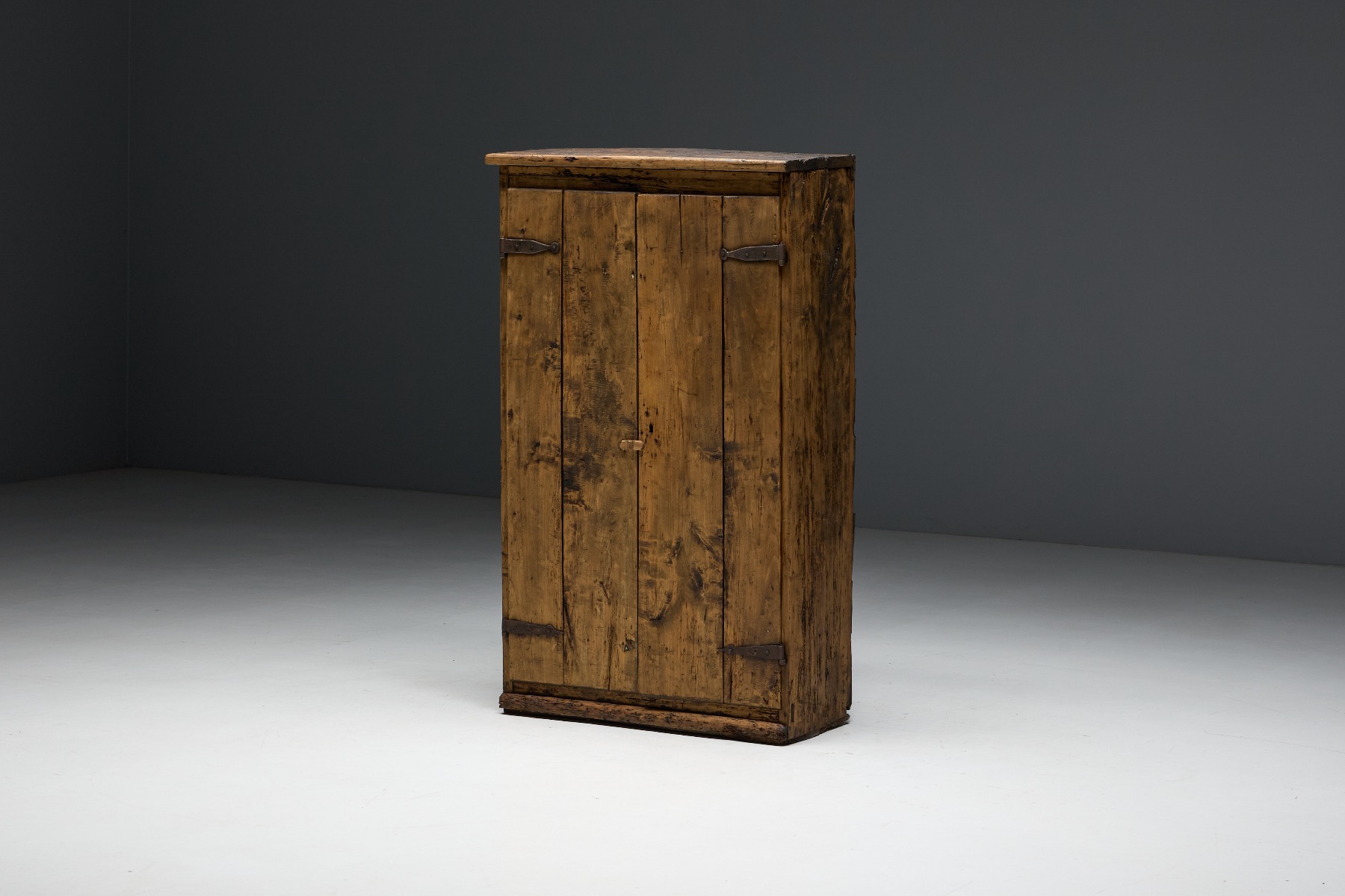 Aged wood travail populaire cabinet showing authentic wear