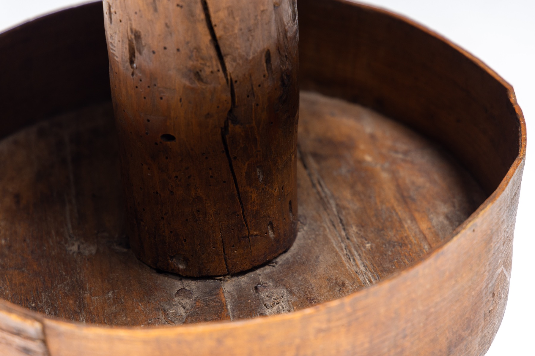 Aged wood round tripod side table in primitive style