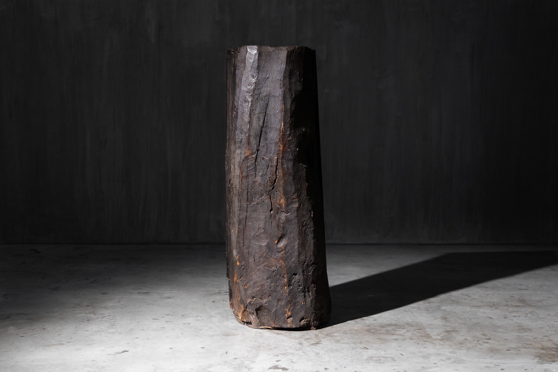 Aged wood vernacular cabinet with timeworn surface