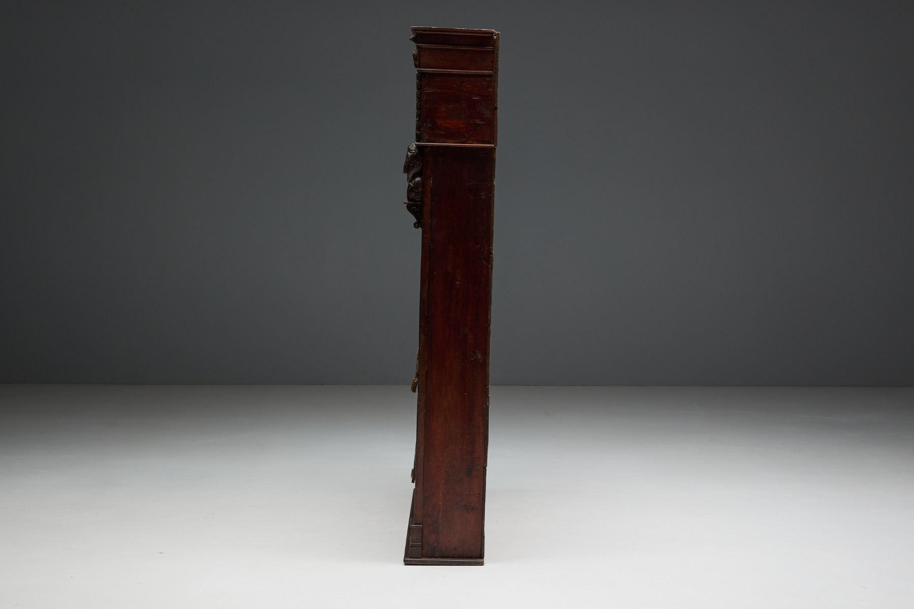 19th century French carved bookcase with expressive wood relief and open storage