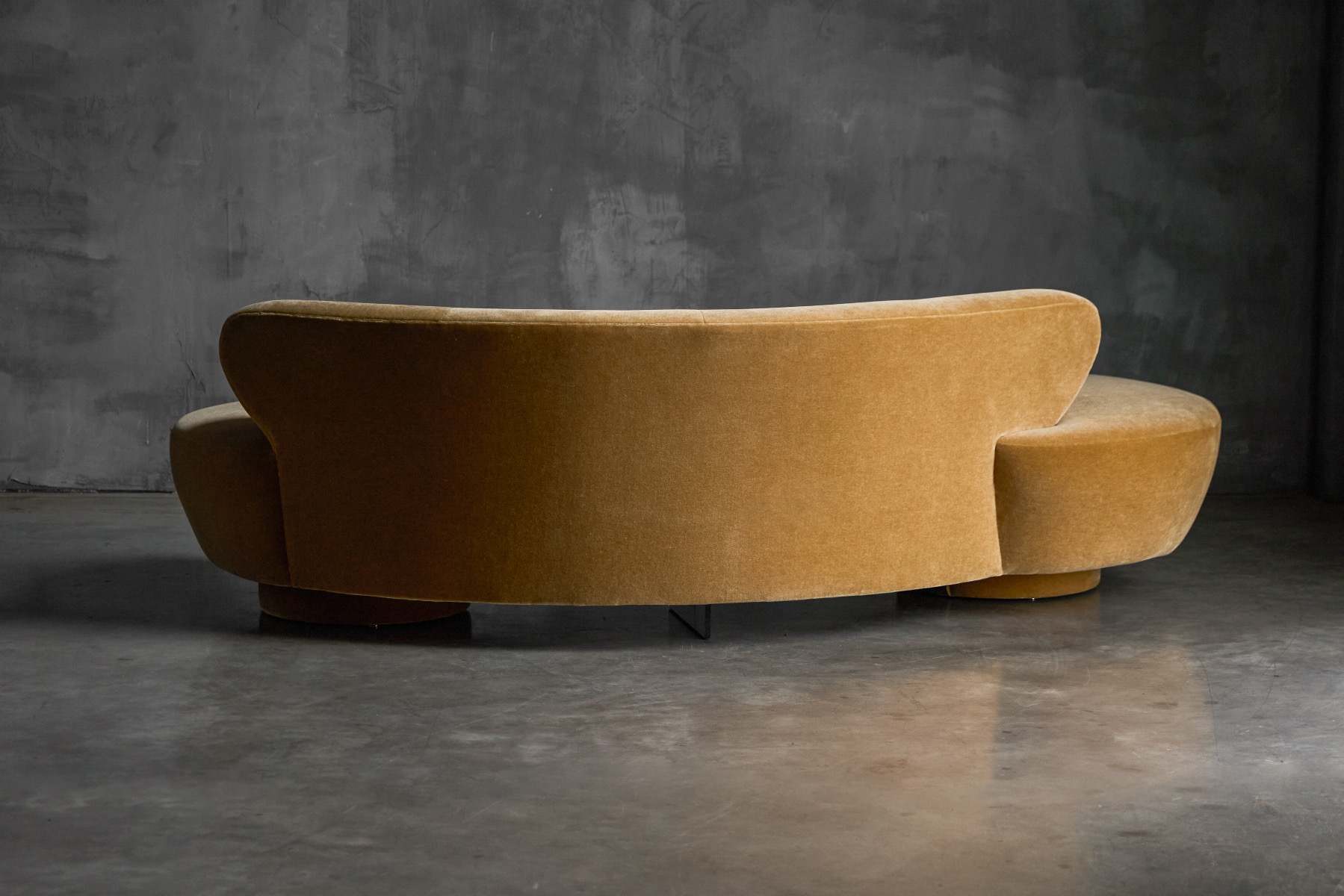 Collectible Serpentine sofa with sculptural presence