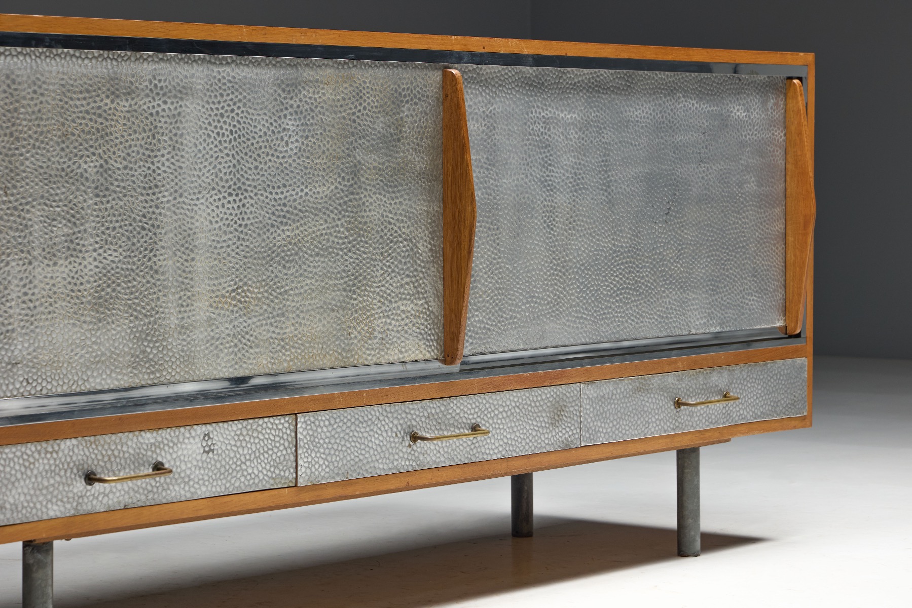 Collectible mid century modern sideboard with metal facade