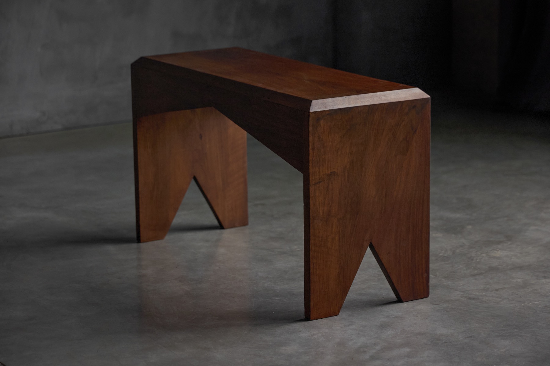 Collectible walnut bench with modernist character