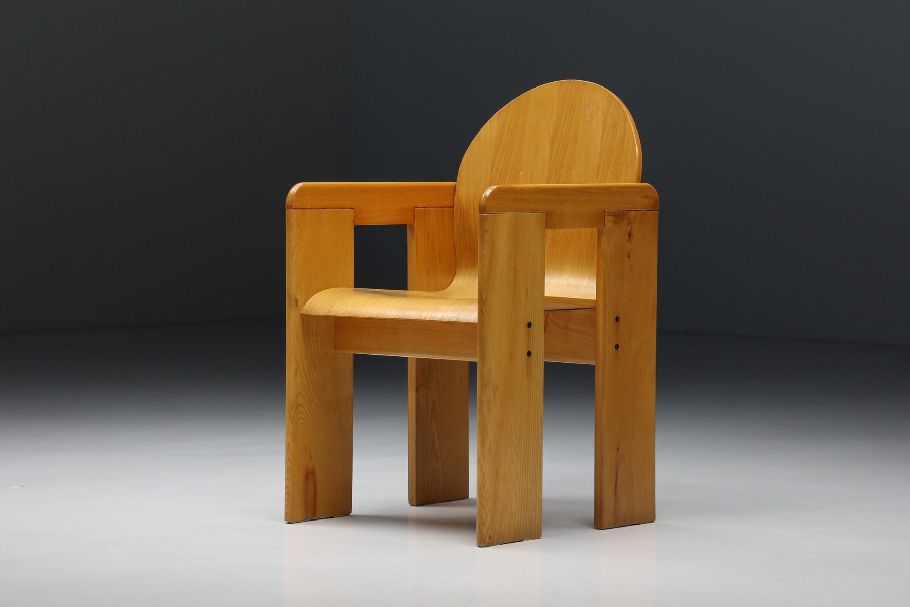 Designer dining chairs by Afra and Tobia Scarpa from the 1970s