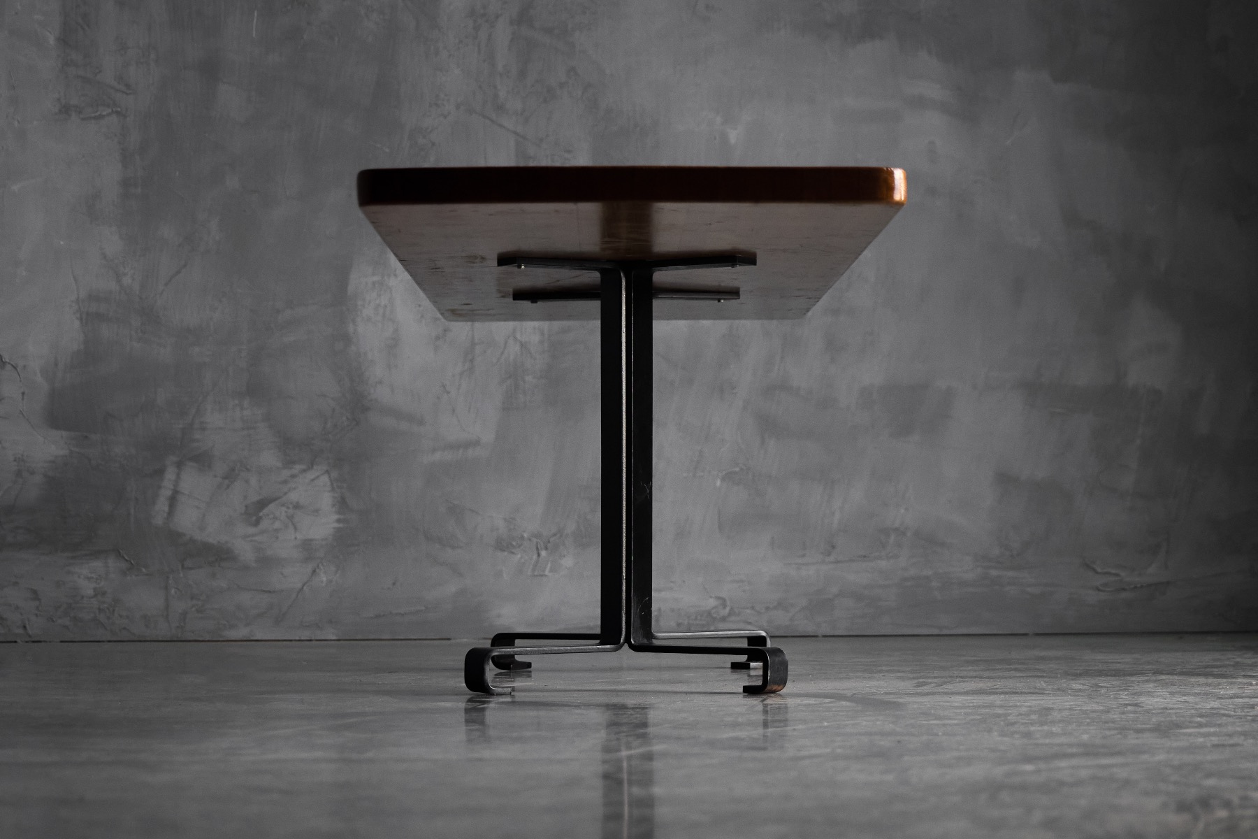 Functionalist dining table reflecting Perriand’s design approach