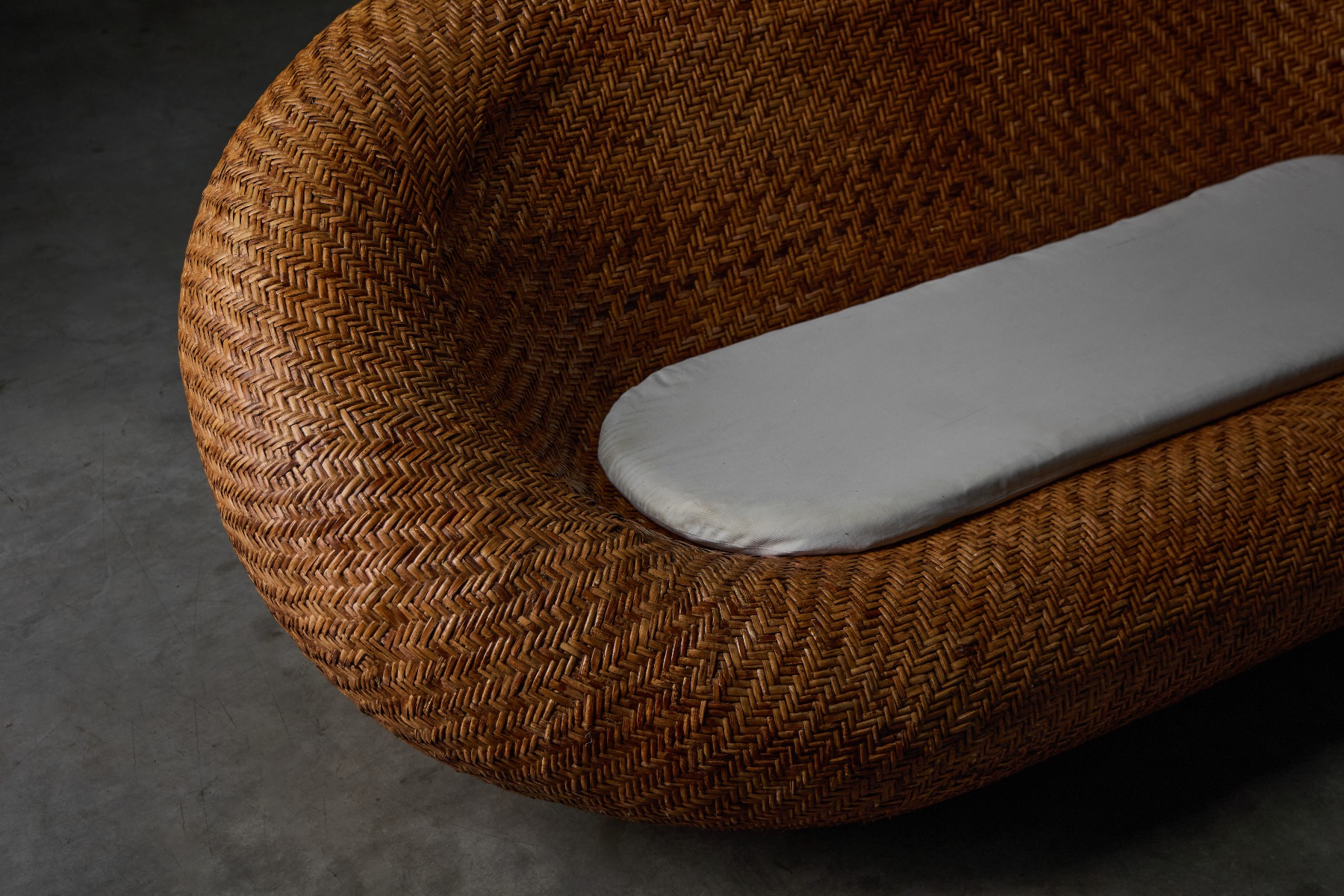 Airy wicker sofa with relaxed modern proportions