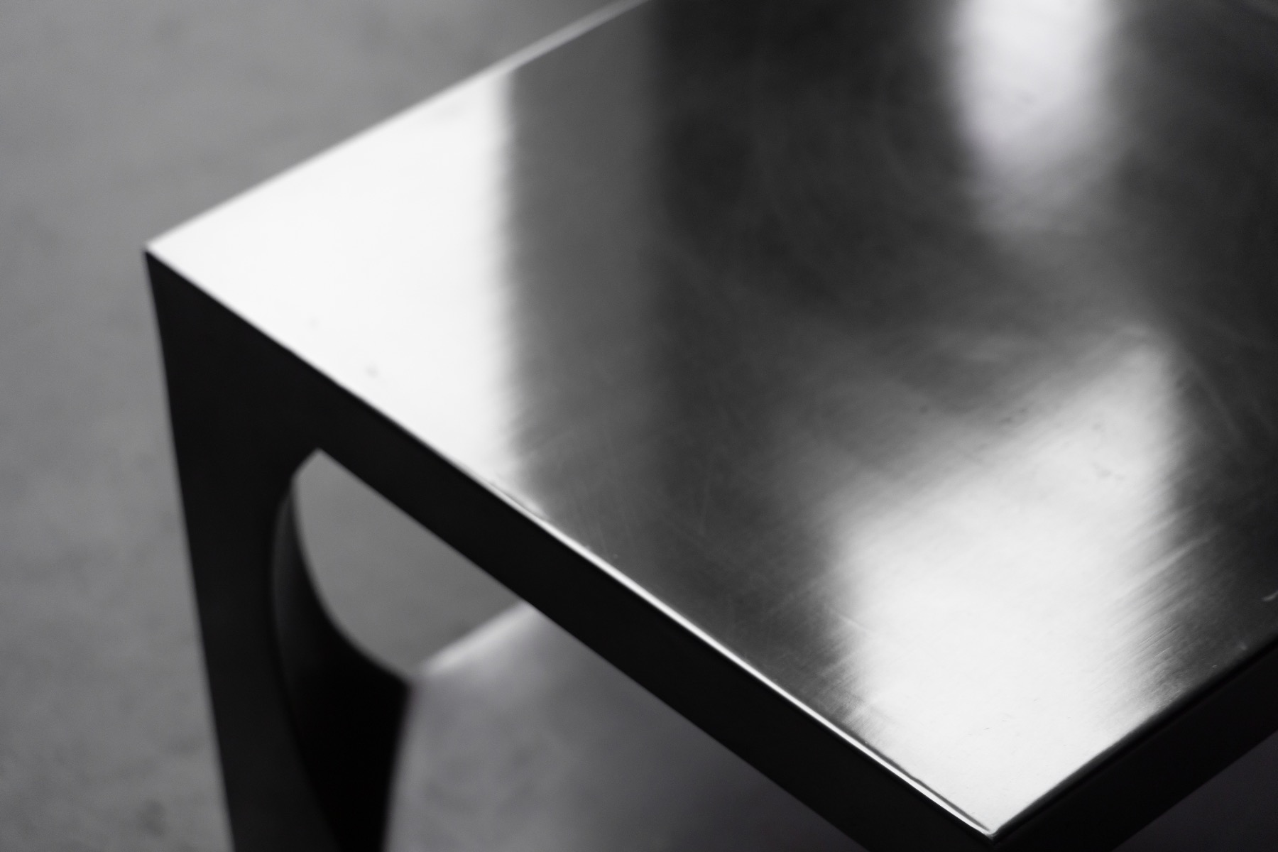 Mid century modern aluminum side table with simple lines