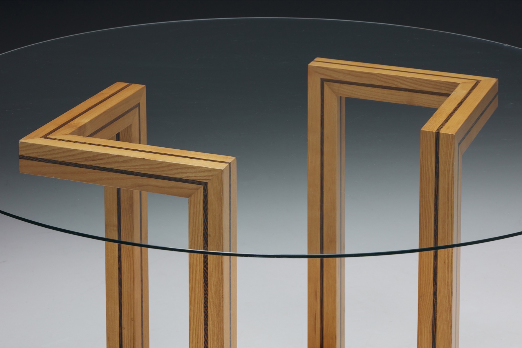 Minimalist round glass dining table from the 1970s