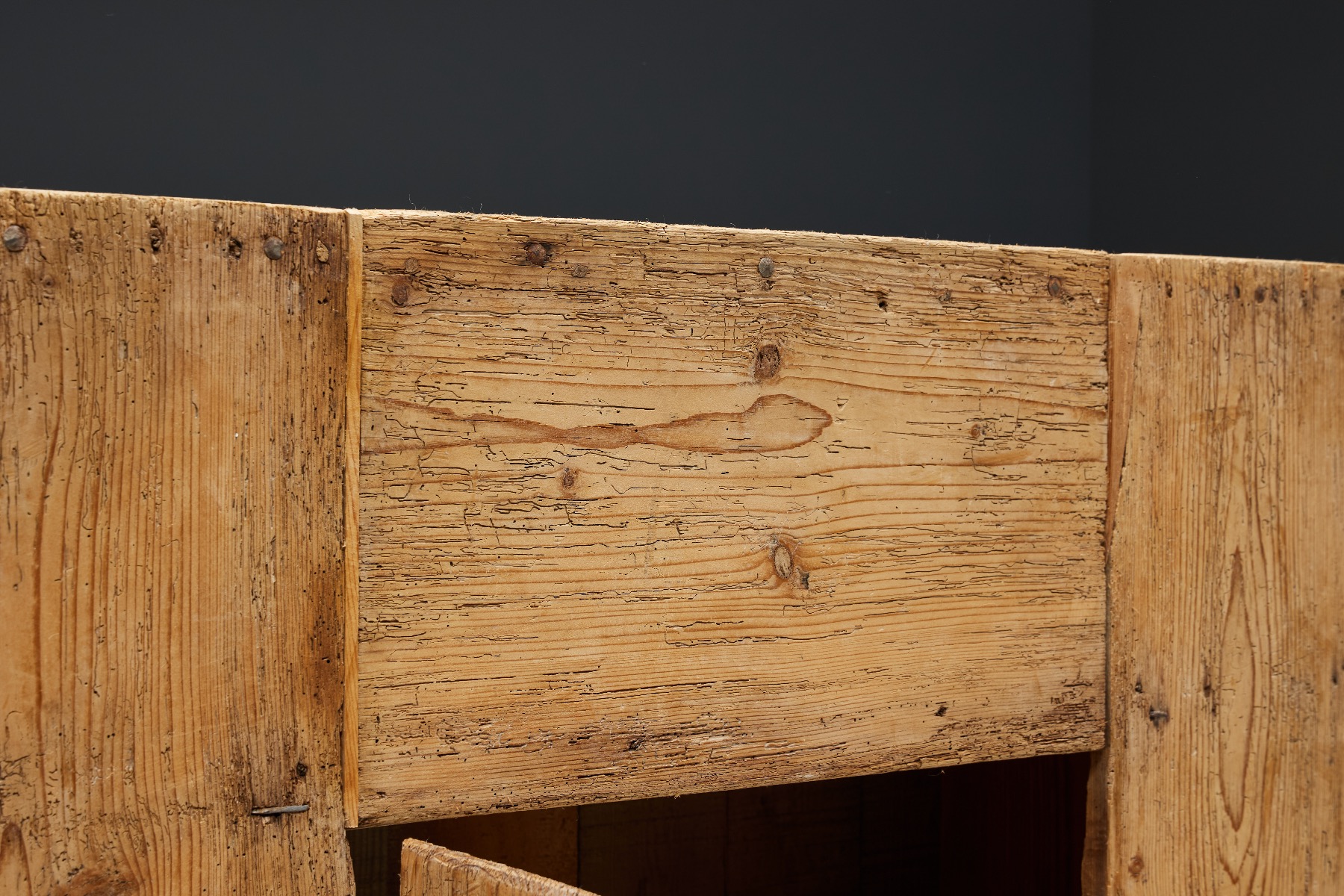 Naive handmade cabinet in wooden furniture