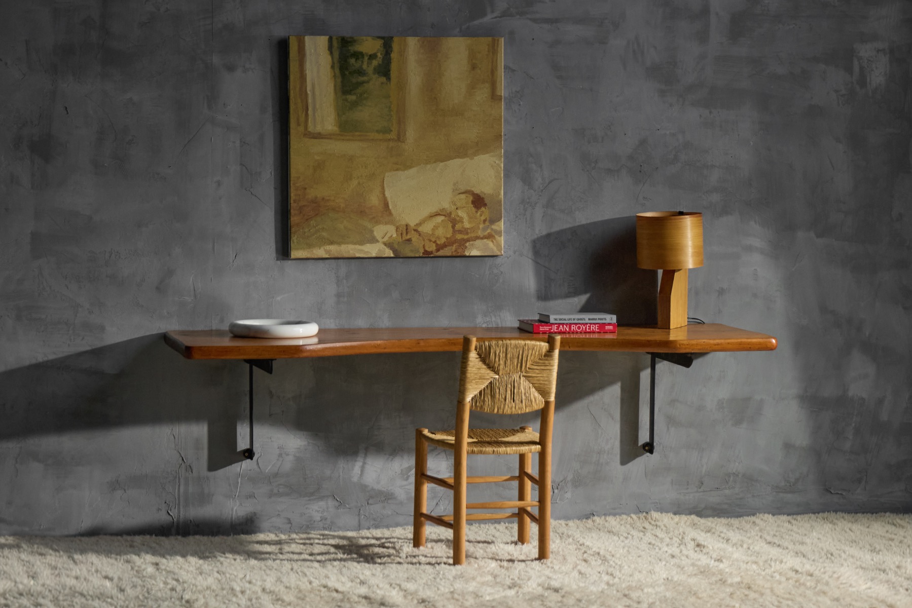 Wall desk with pine surface and black lacquer brackets by Charlotte Perriand