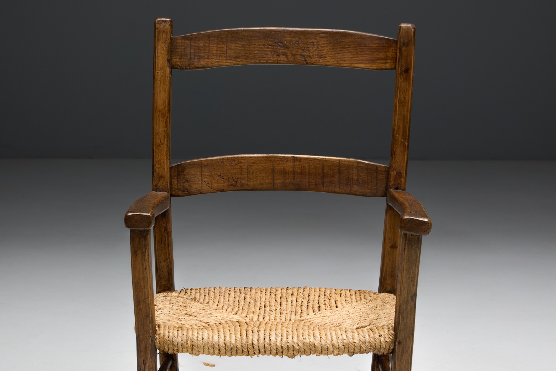 Rural wooden armchair from the early 20th century