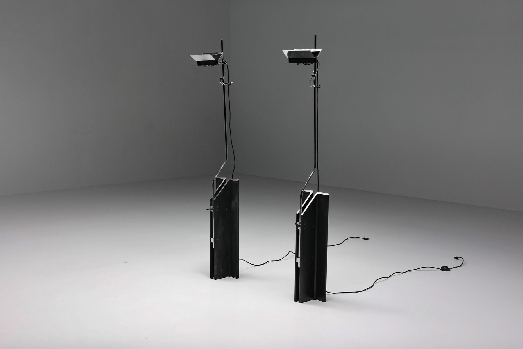 Sleek chrome adjustable floor lamps in modern style