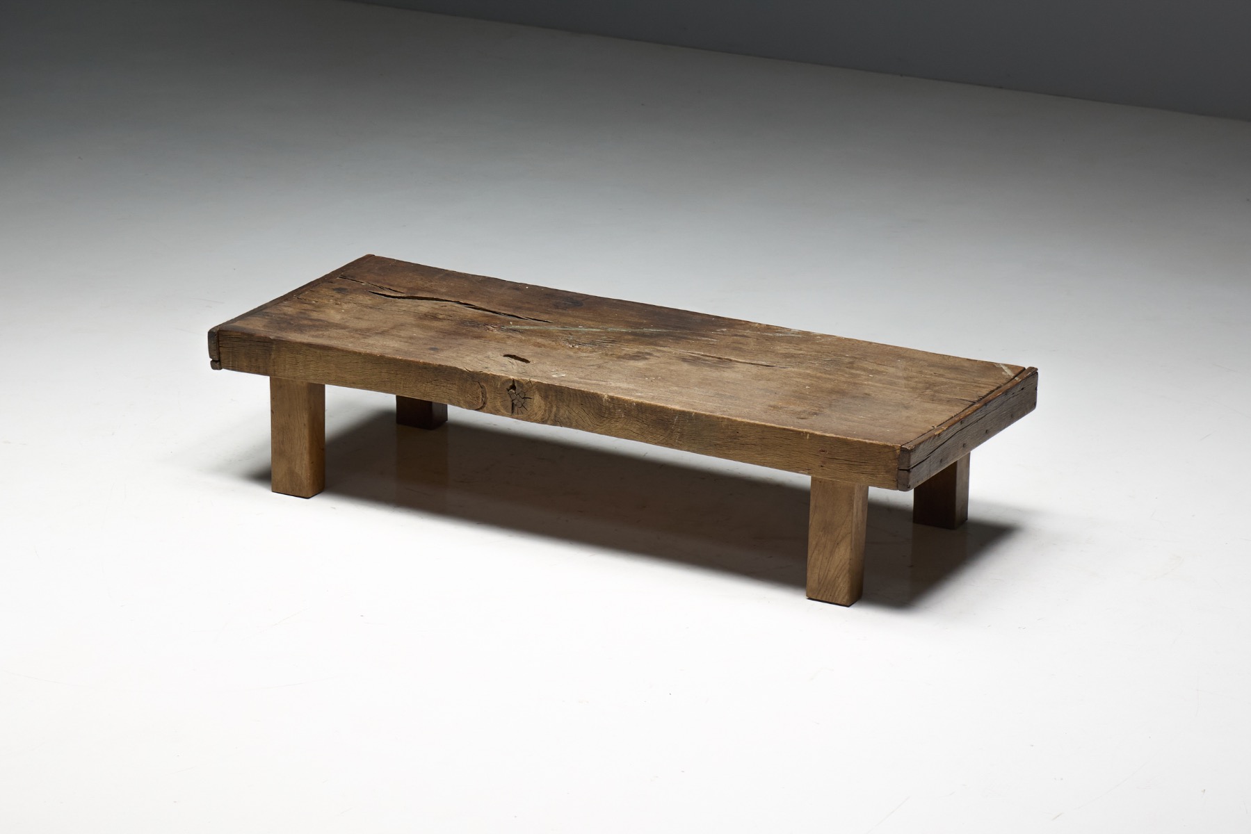 Timeworn low farmhouse table with authentic patina