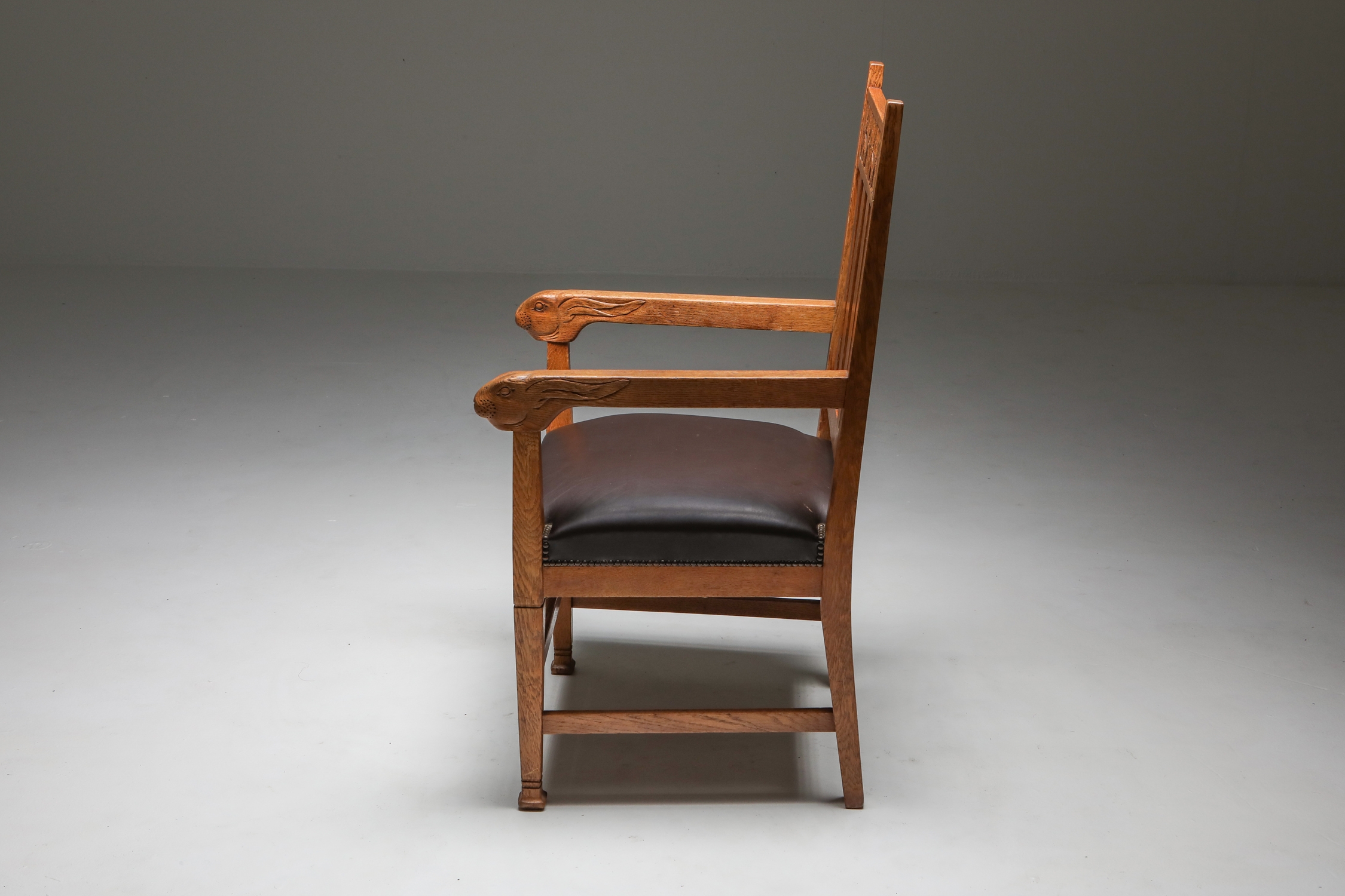 Arts & Crafts Conference Chair with Hand Carved Rabbit Head Handles - 1920's