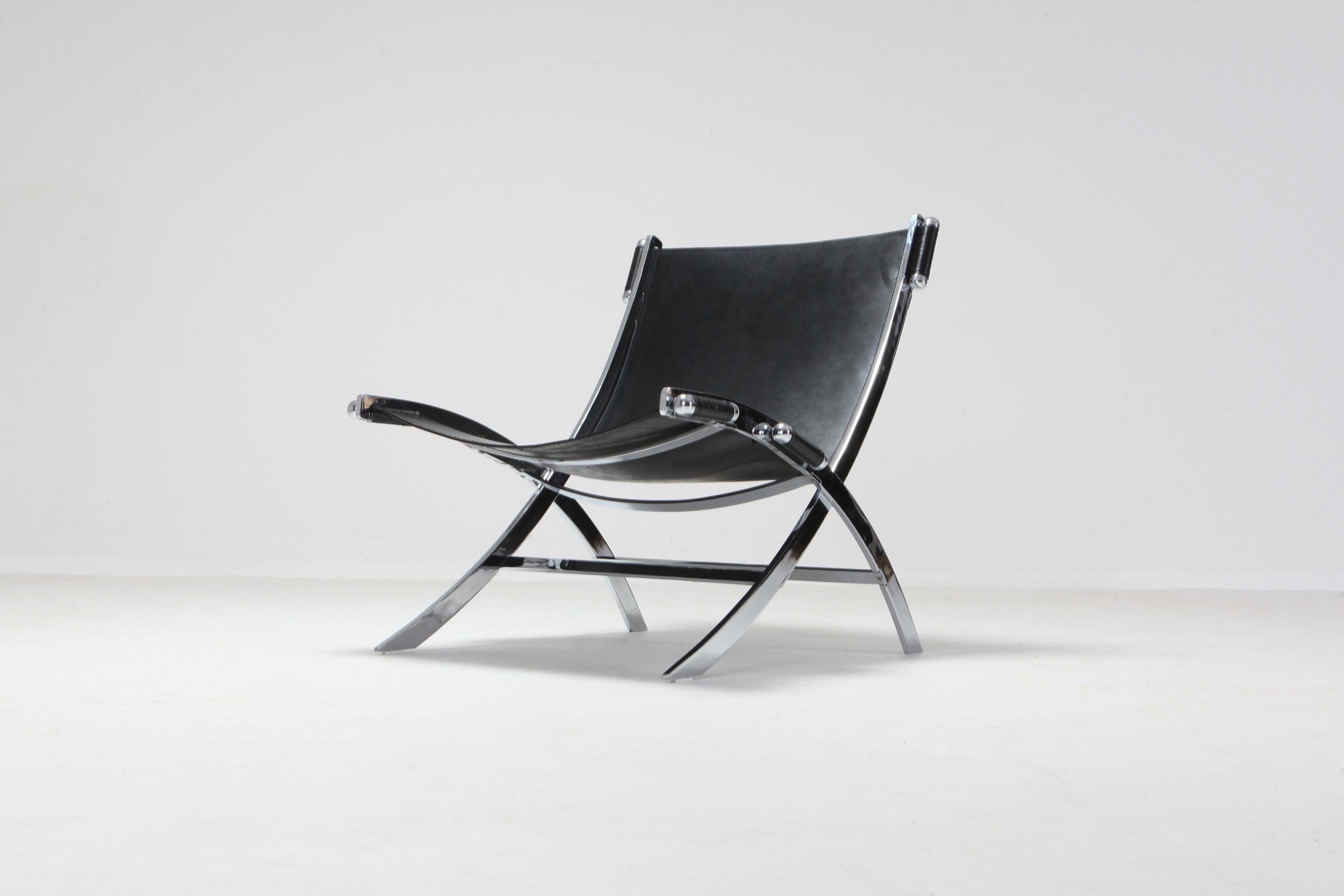 Paul Tuttle for Flexform Lounge Chair in Chrome & Black Leather - 1980's