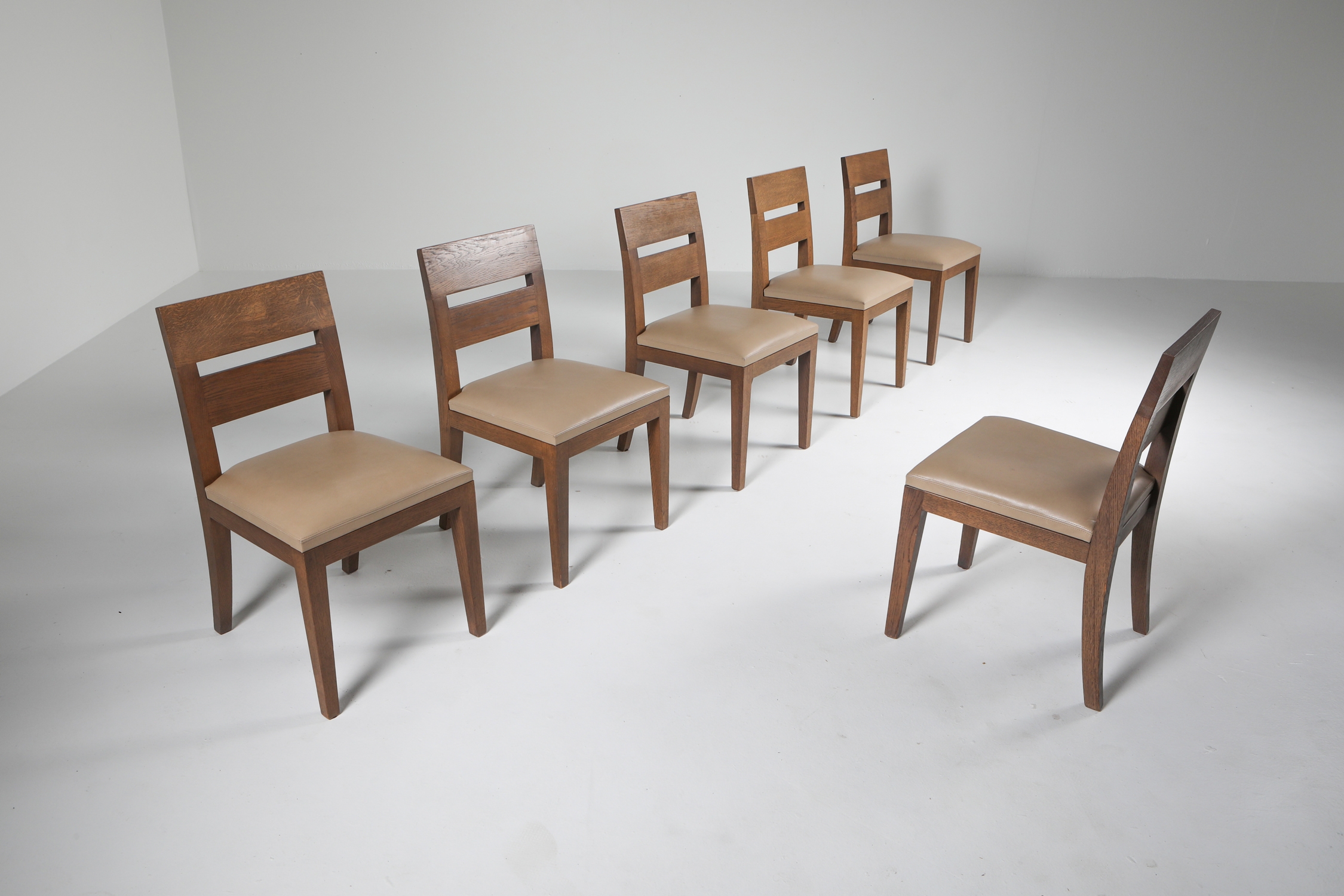 Liaigre Dining Chairs set of six in Stained Oak and Leather - 1999