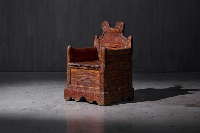 19th century armchair with inner storage compartment