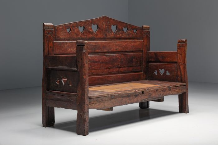 Carved bench with storing space from the nineteenth century