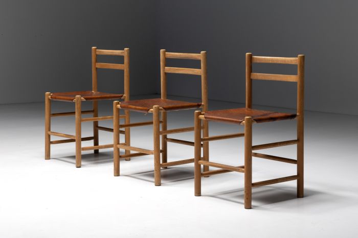 French wood and leather dining chairs from the 1950s